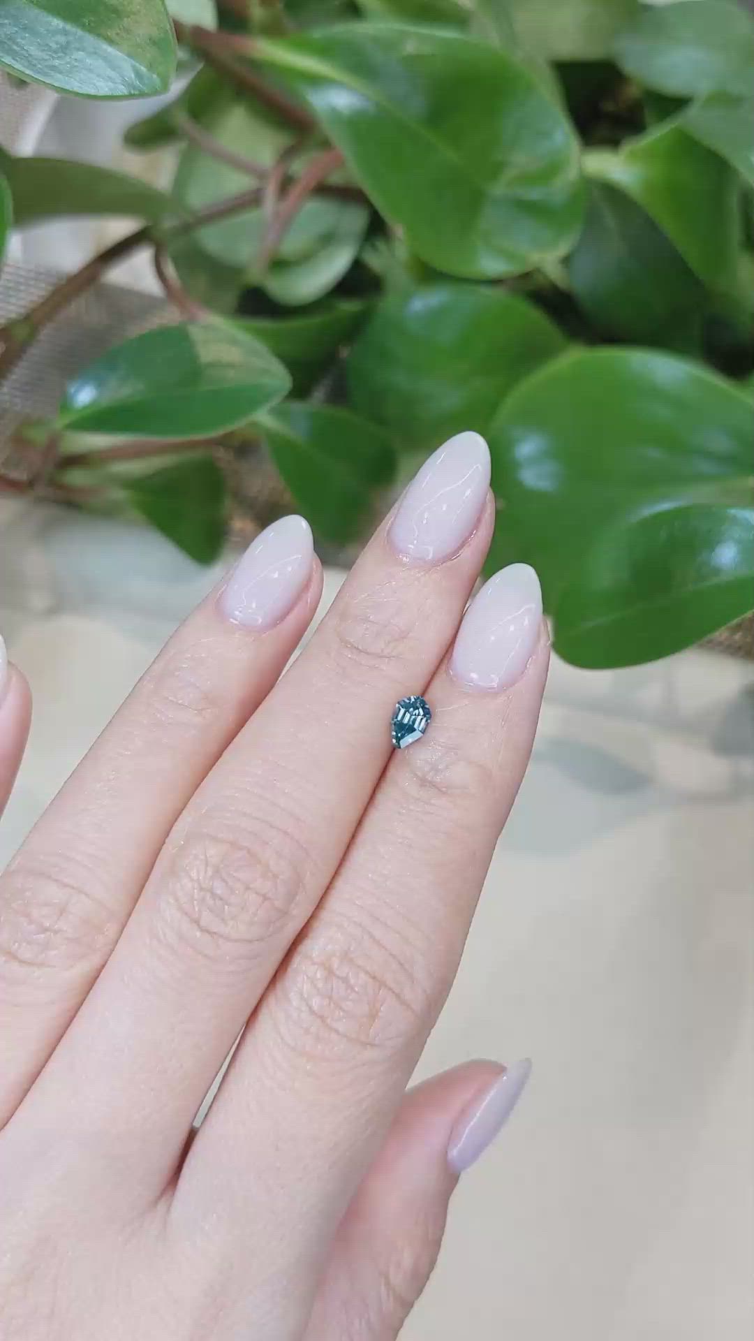 0.47 Ct. Bluish Green Sapphire from Montana Size Video