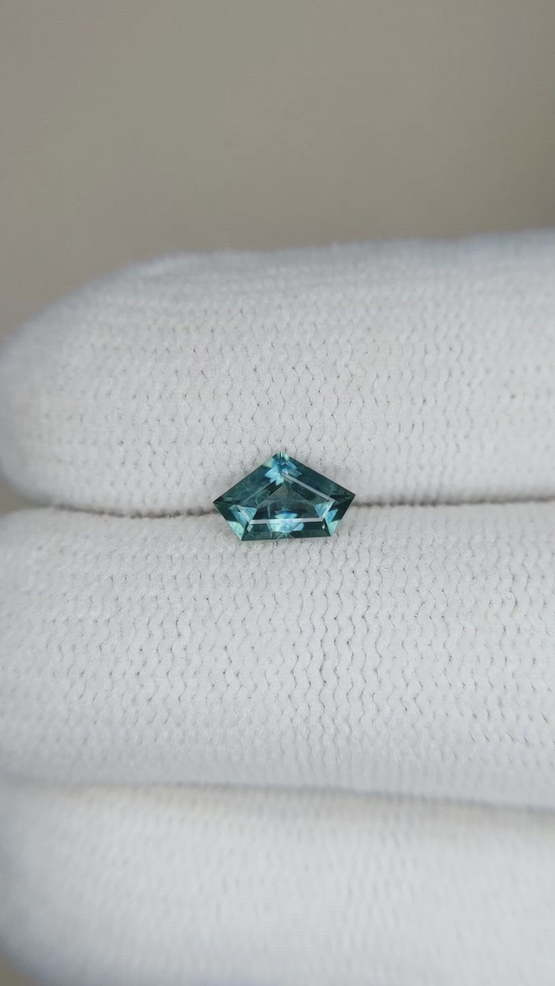 0.51 Ct. Bluish Green Sapphire from Montana Size Video