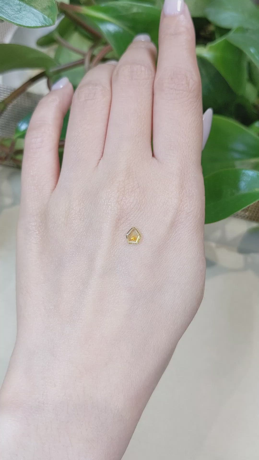 0.61 Ct. Yellow Sapphire from Montana Size Video