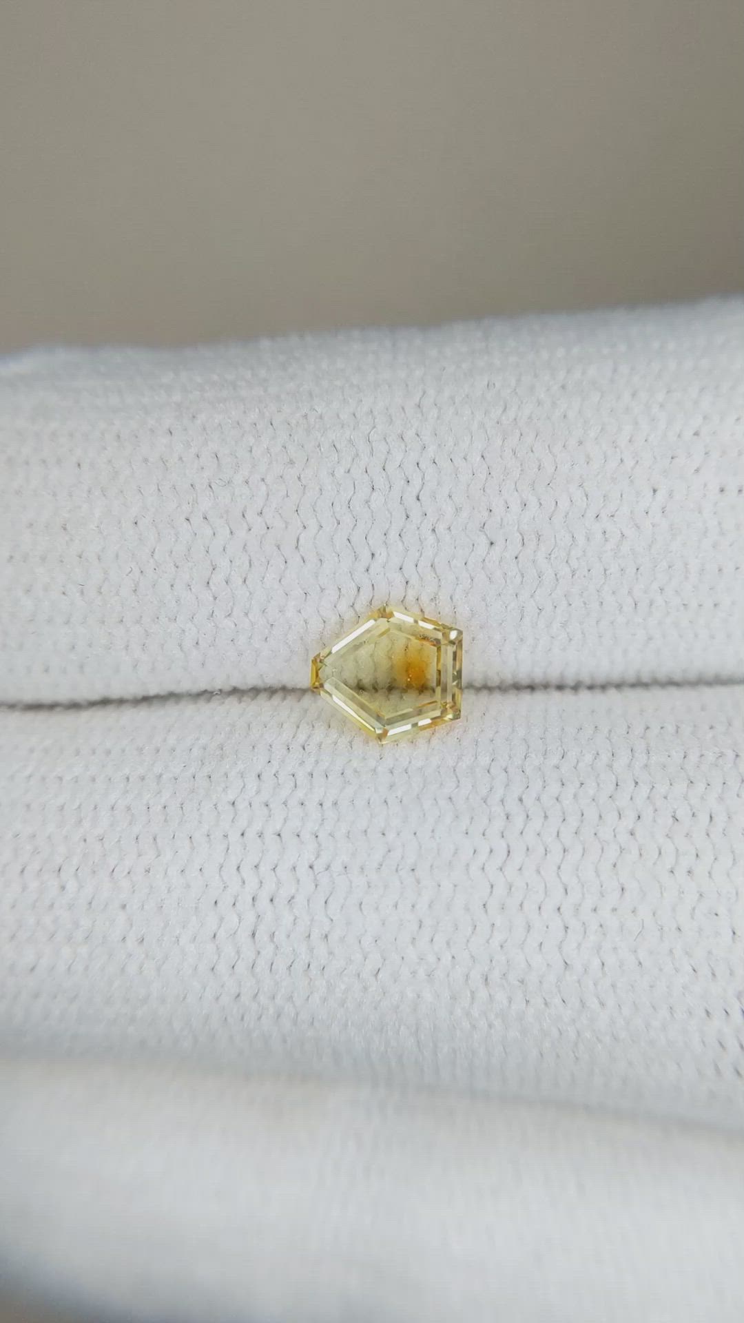 0.61 Ct. Yellow Sapphire from Montana Size Video