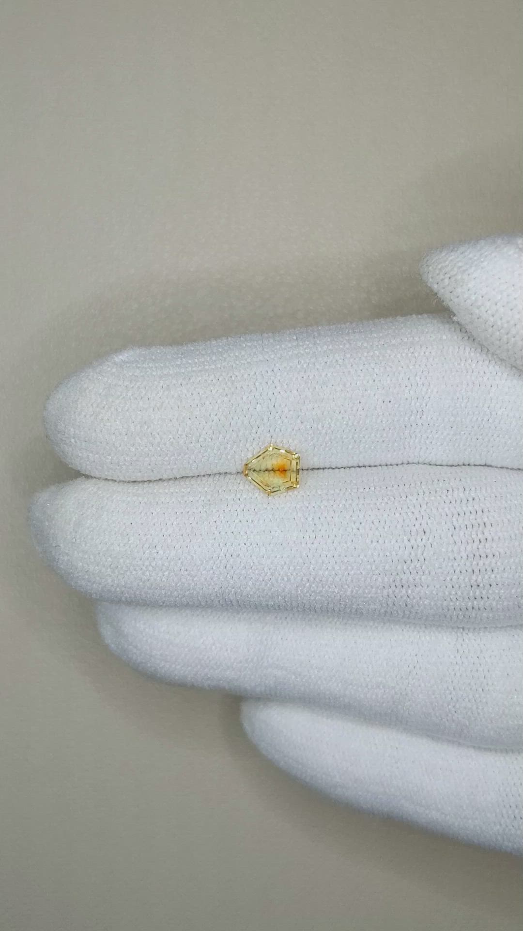 0.61 Ct. Yellow Sapphire from Montana Size Video