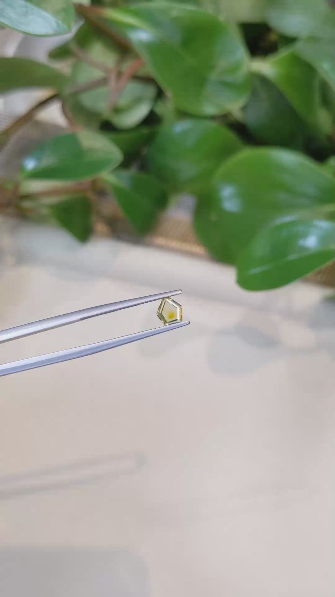 0.61 Ct. Yellow Sapphire from Montana Size Video