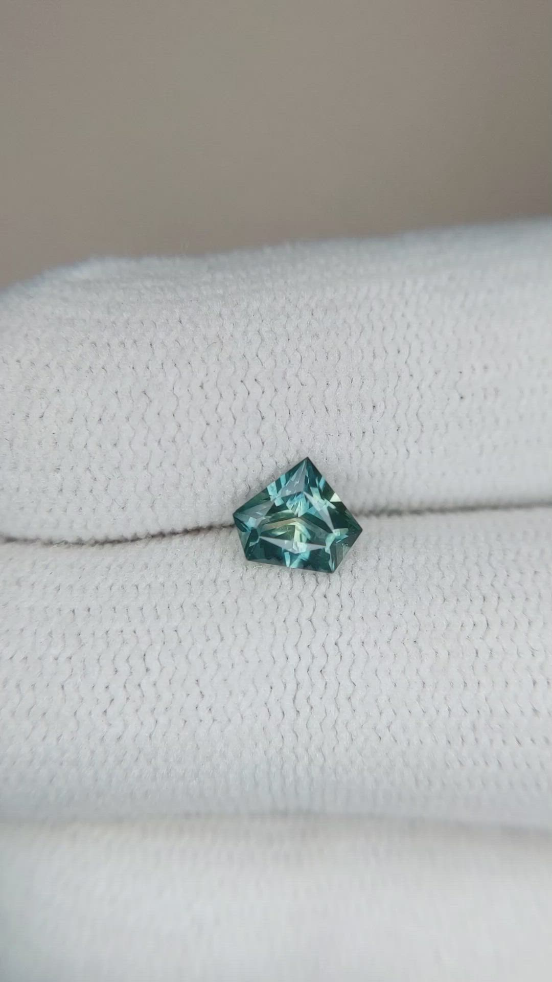 0.66 Ct. Bluish Green Sapphire from Montana Size Video