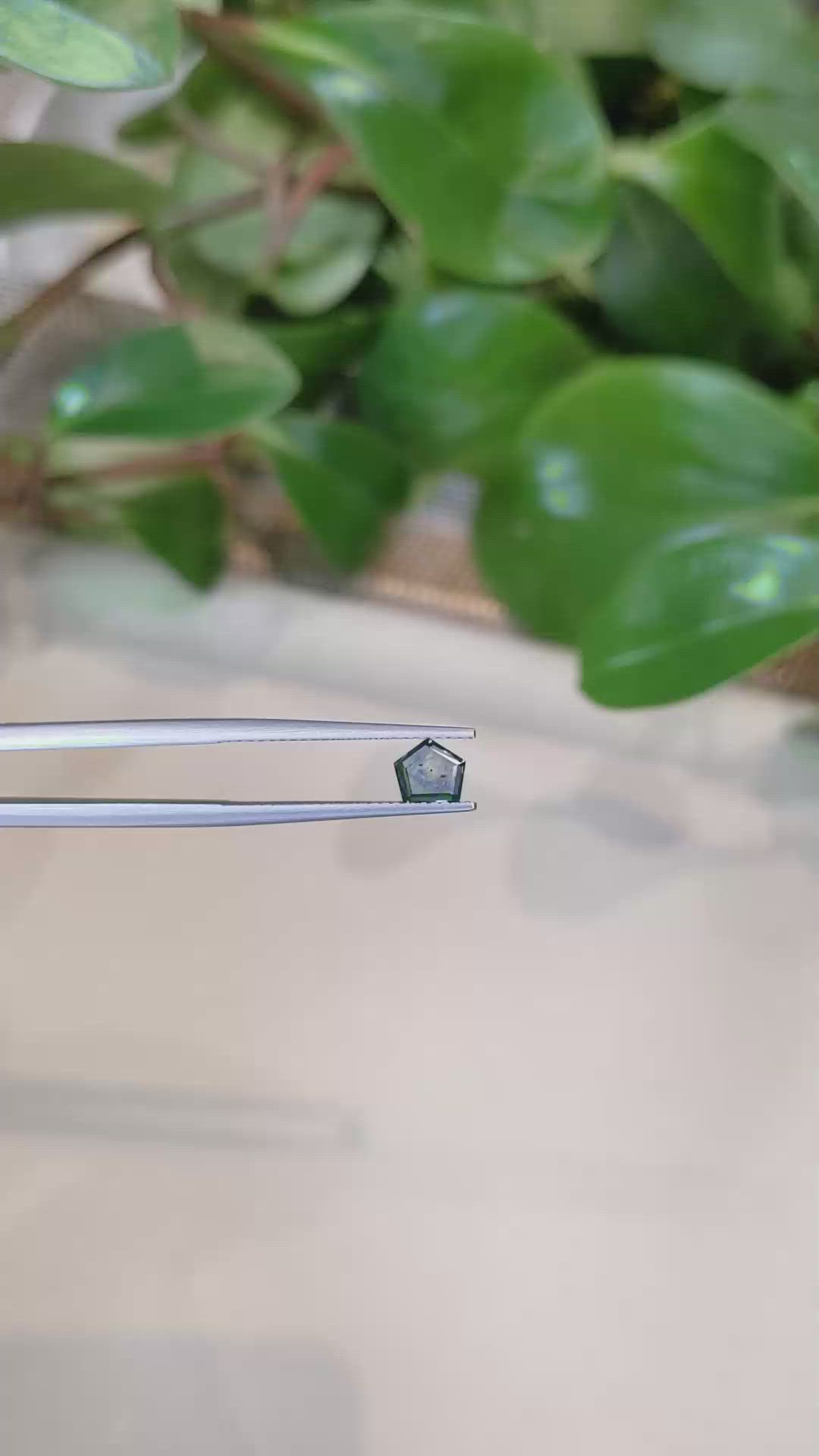 0.66 Ct. Bluish Green Sapphire from Montana Size Video