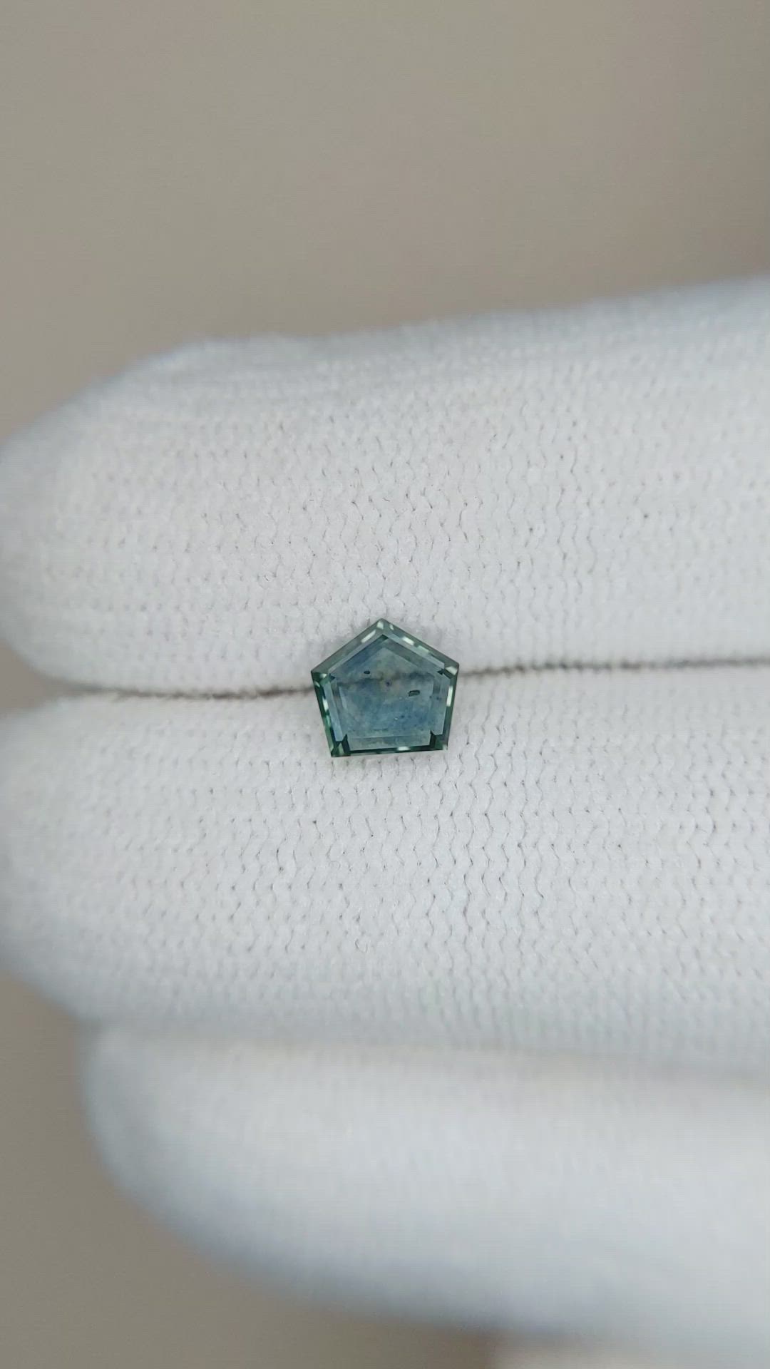 0.66 Ct. Bluish Green Sapphire from Montana Size Video