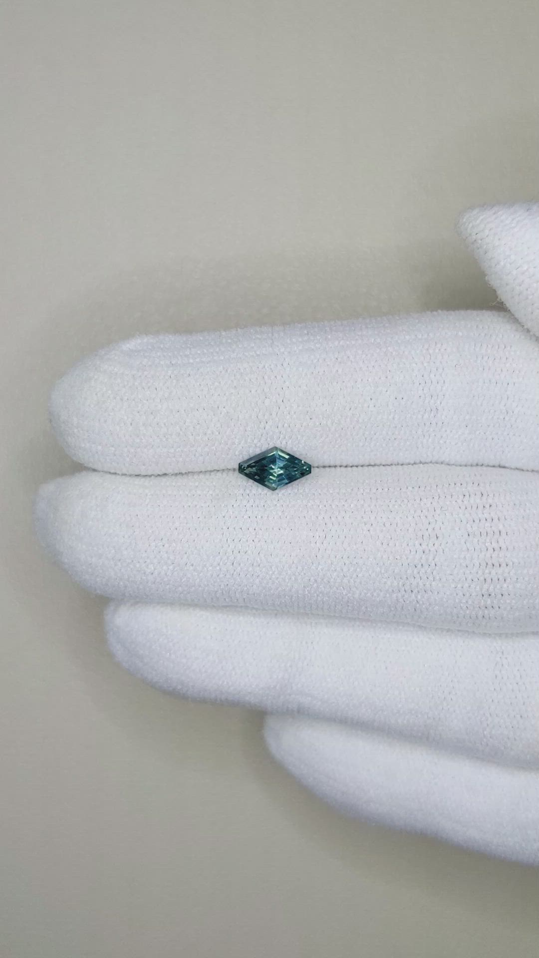 0.59 Ct. Bluish Green Sapphire from Montana Size Video