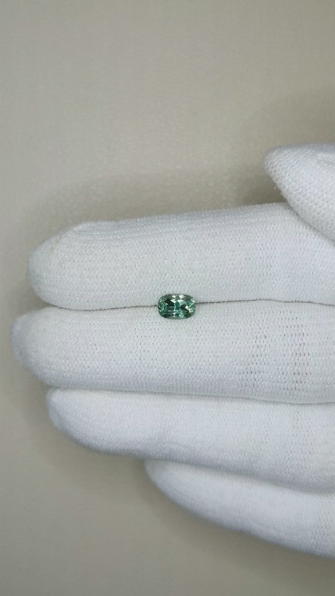 0.62 Ct. Bluish Green Sapphire from Montana Size Video