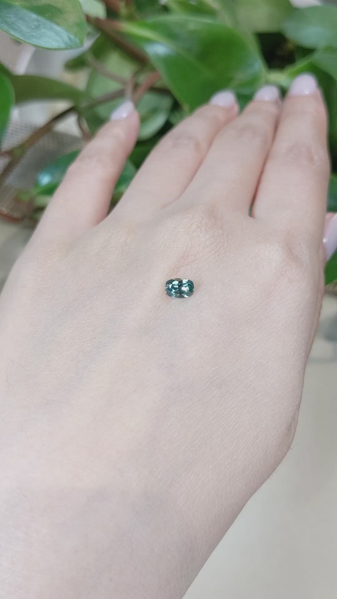 0.62 Ct. Bluish Green Sapphire from Montana Size Video