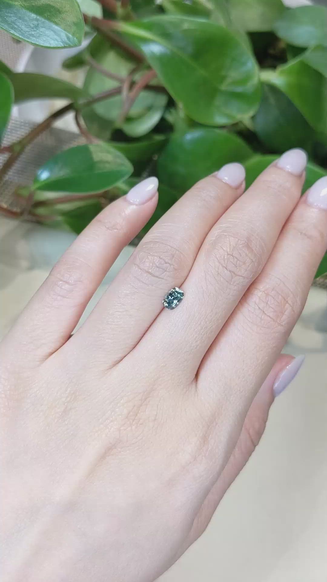 0.62 Ct. Bluish Green Sapphire from Montana Size Video