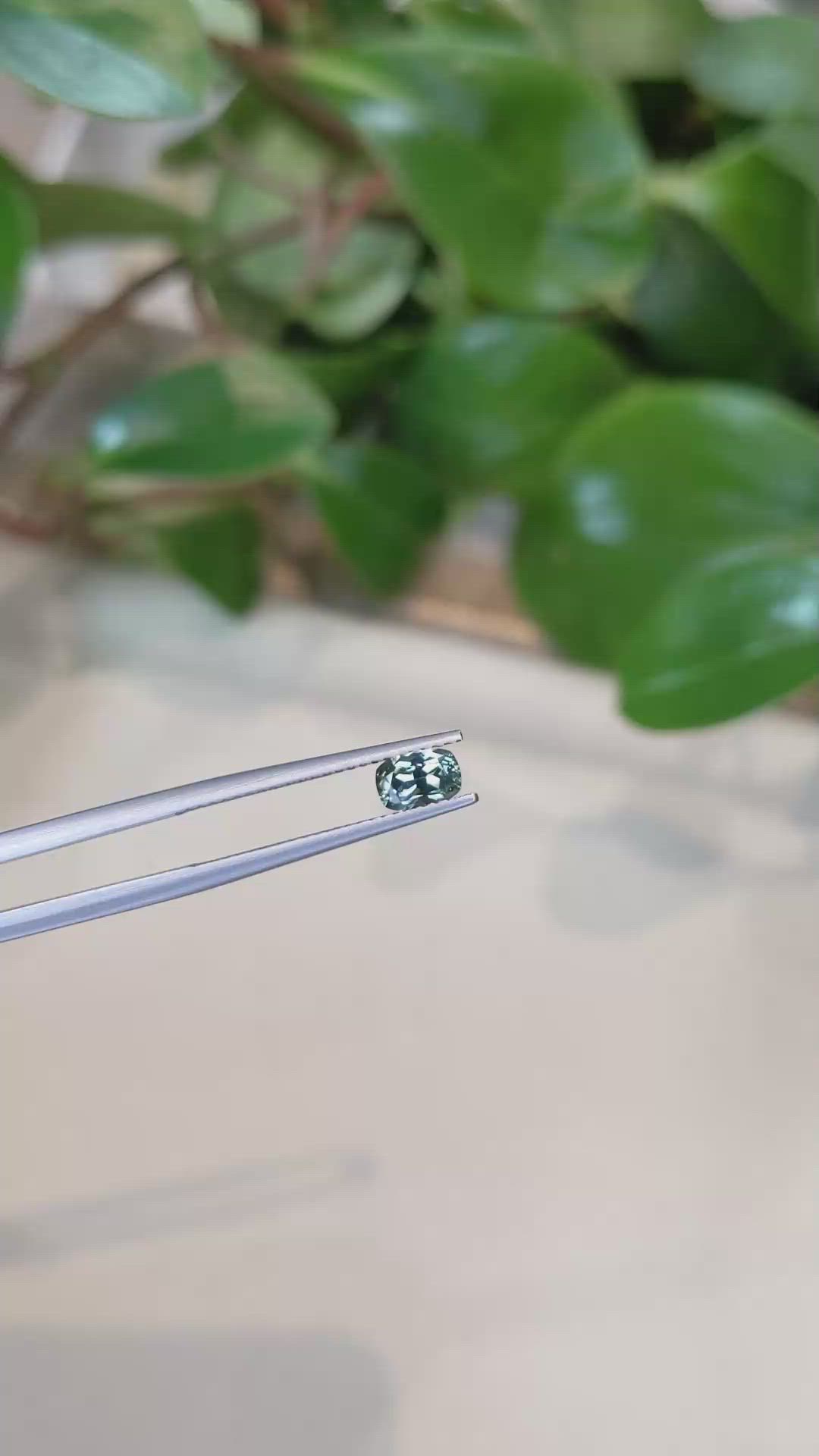 0.62 Ct. Bluish Green Sapphire from Montana Size Video