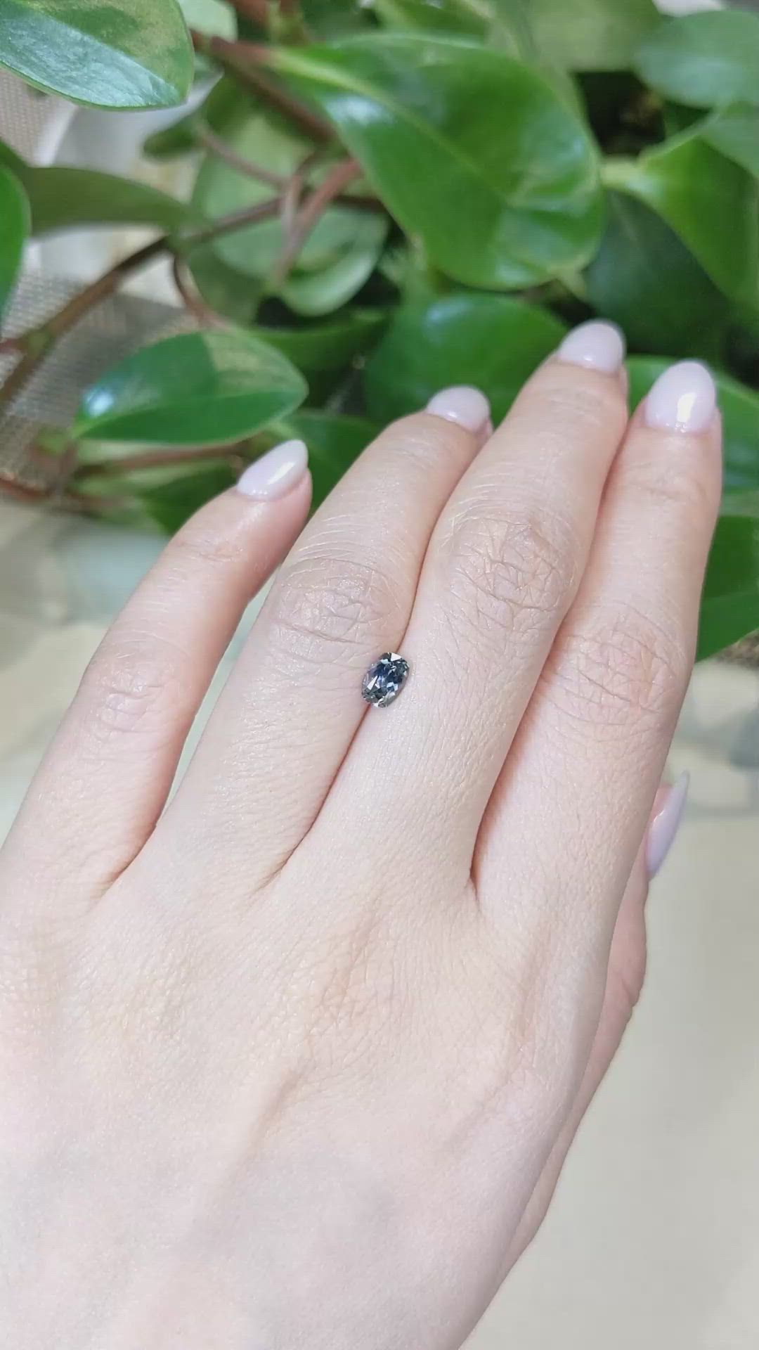 0.64 Ct. Brownish Green Sapphire from Montana Size Video