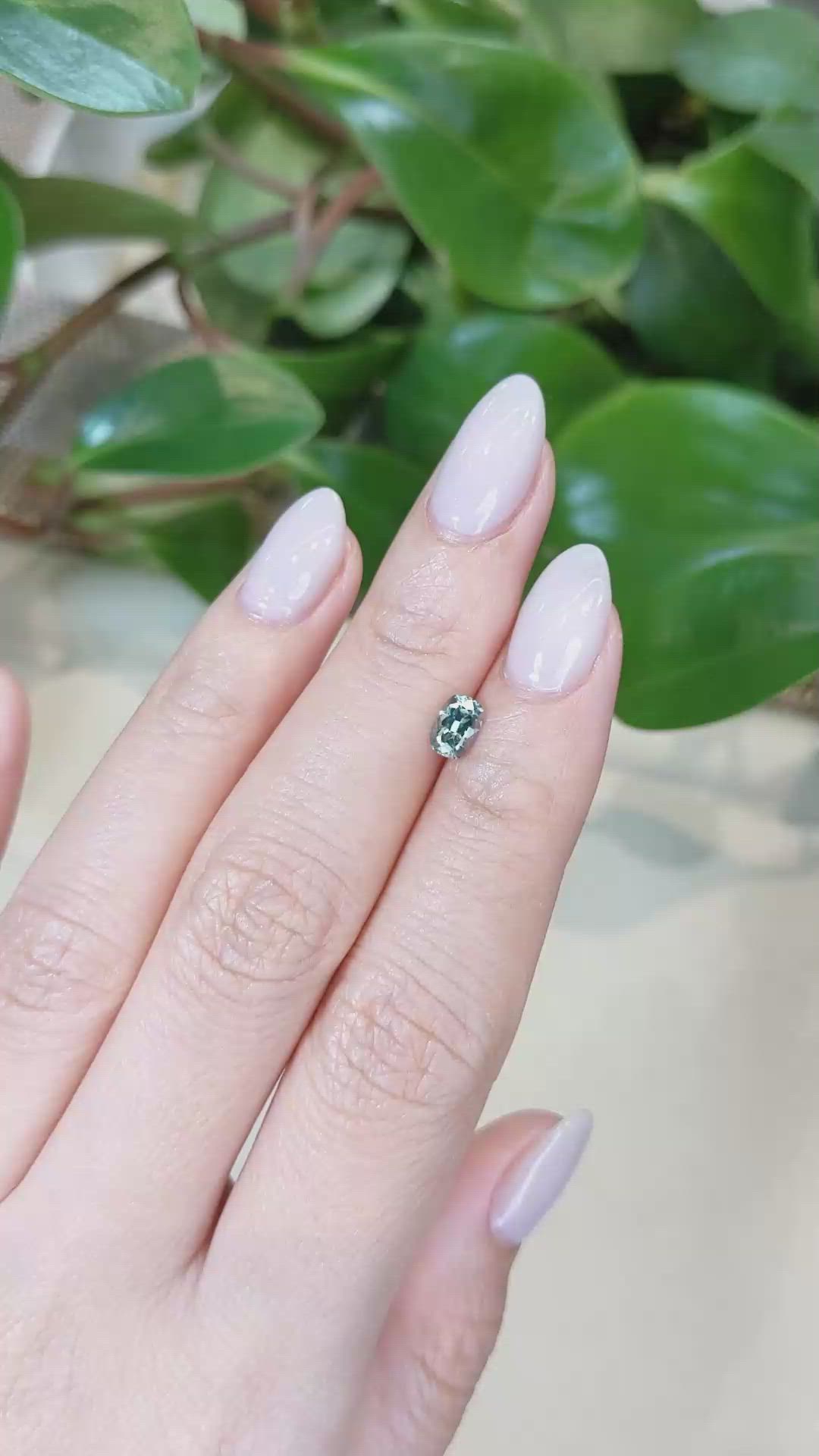 0.69 Ct. Bluish Green Sapphire from Montana Size Video