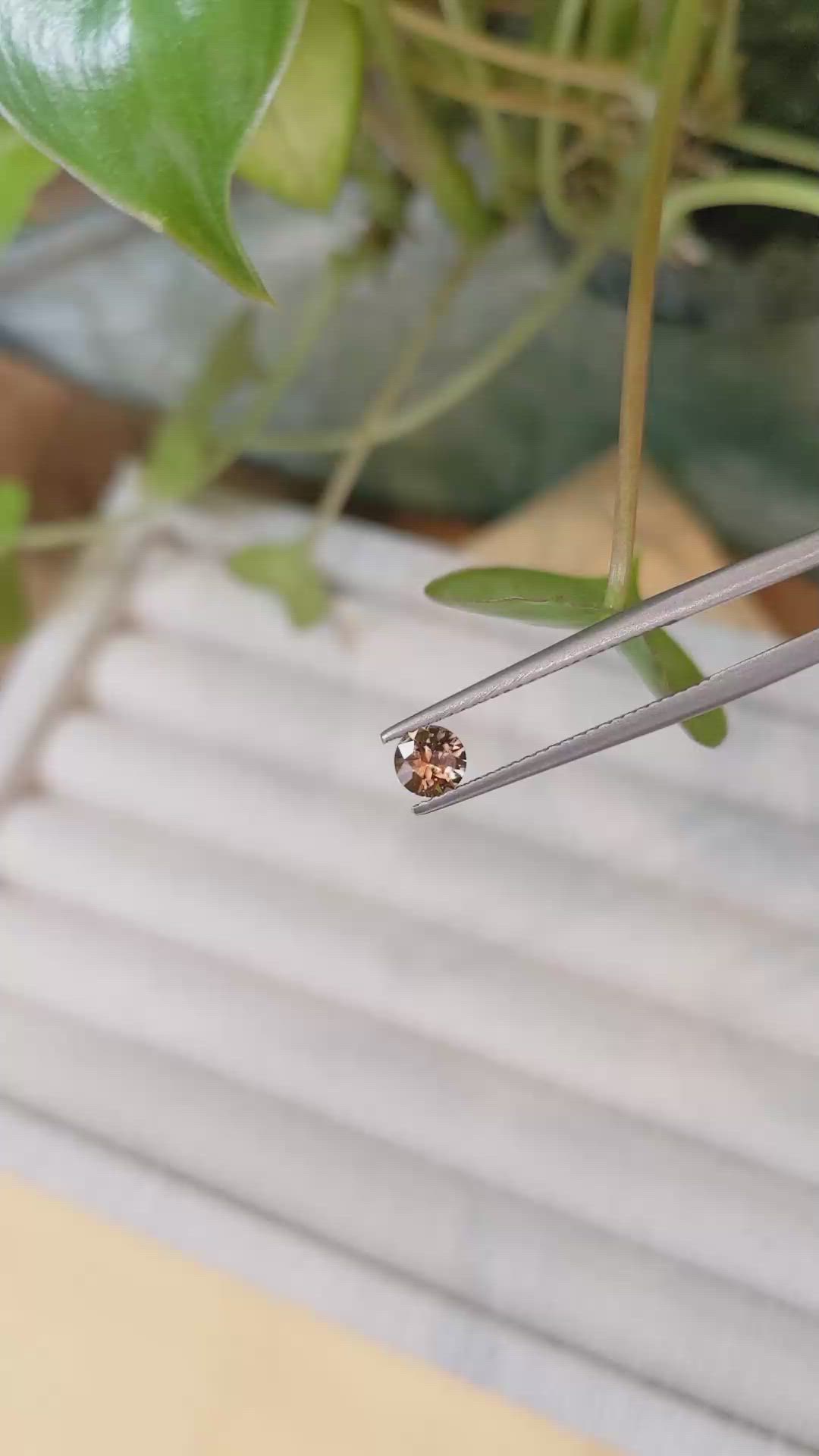 0.46 Ct. Orange Sapphire from Montana Size Video