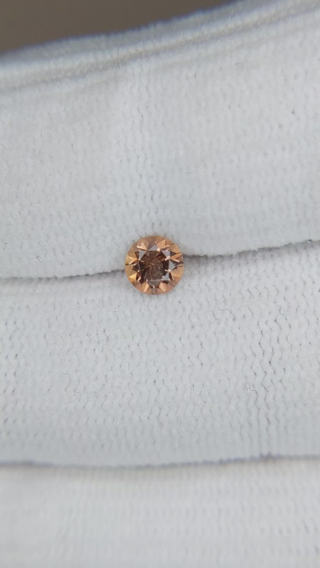 0.46 Ct. Orange Sapphire from Montana Size Video