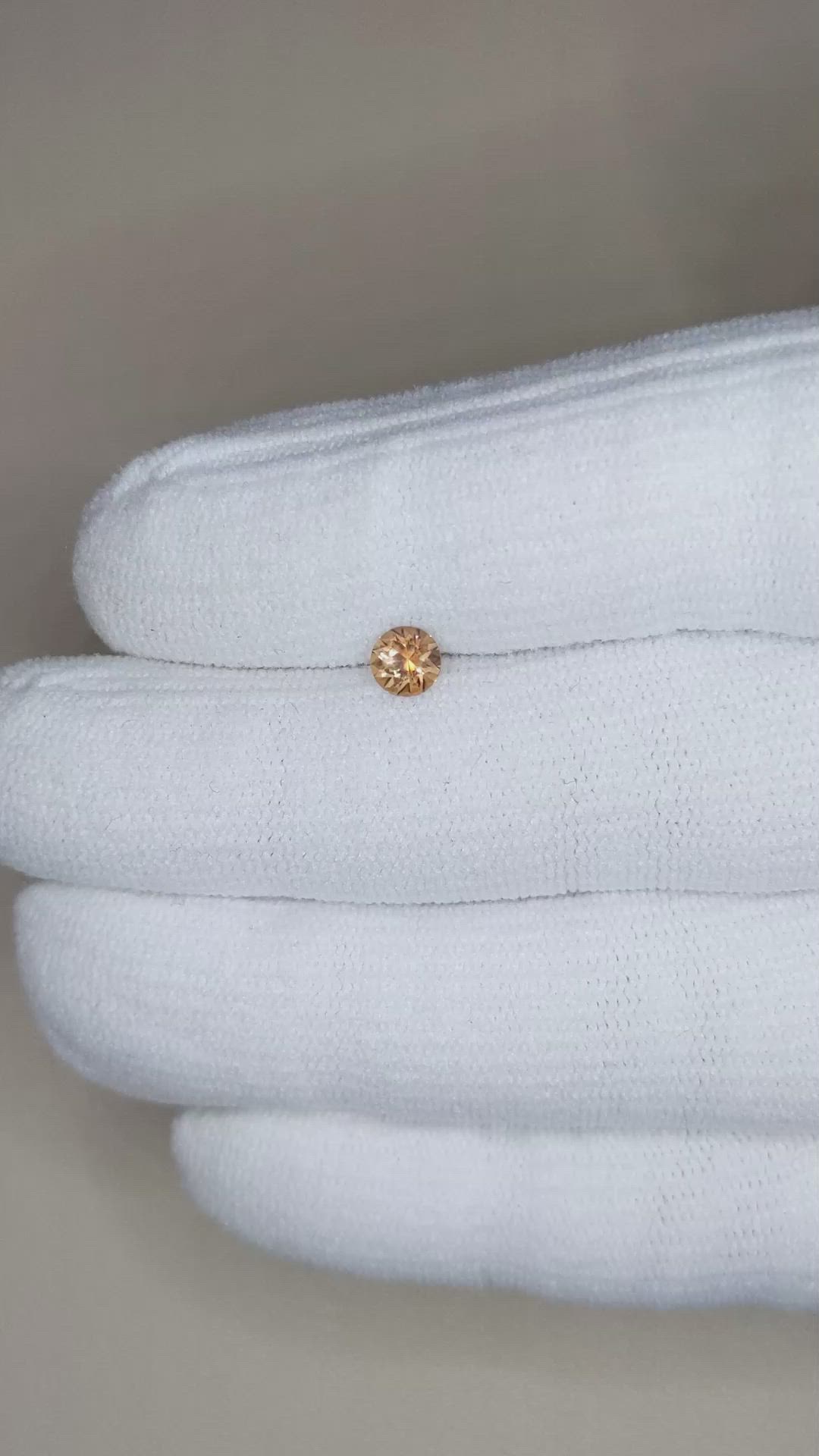 0.46 Ct. Orange Sapphire from Montana Size Video