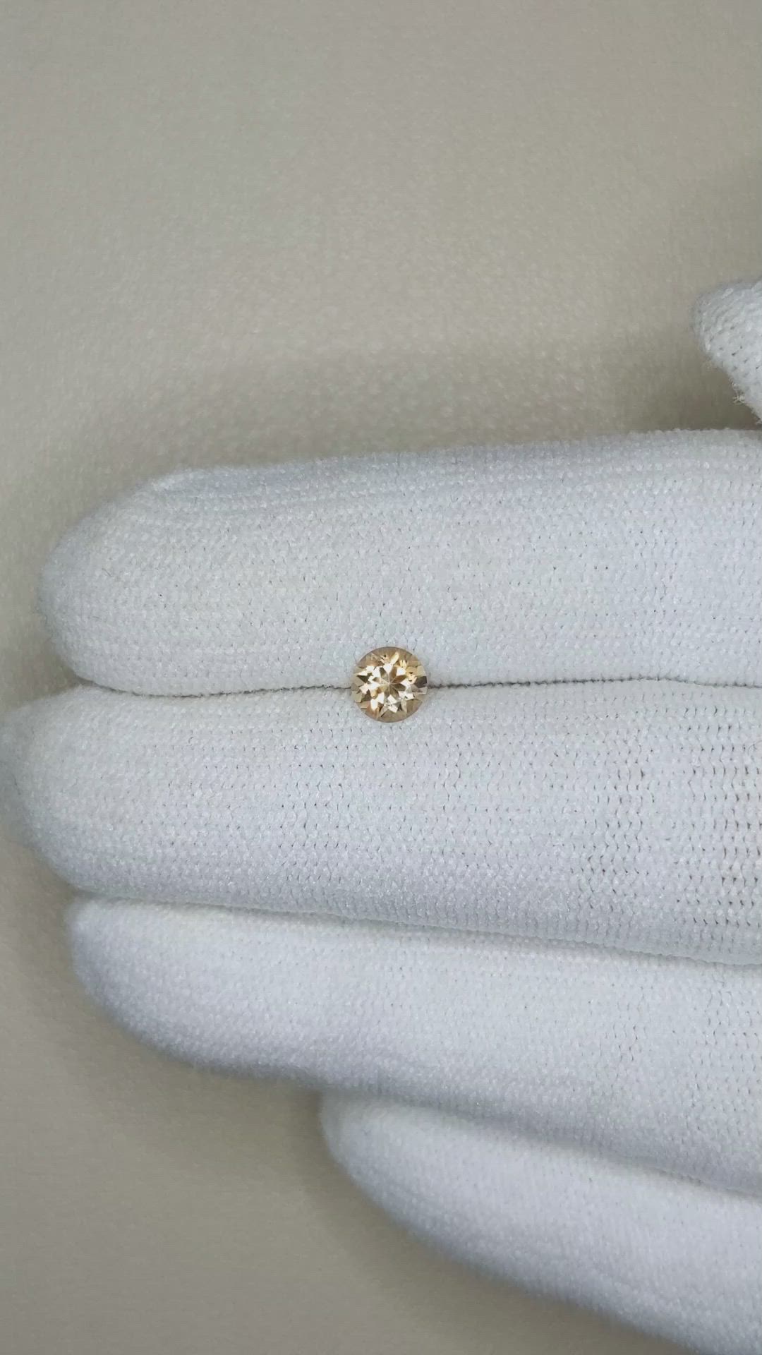 0.47 Ct. Yellowish Brown Sapphire from Montana Size Video