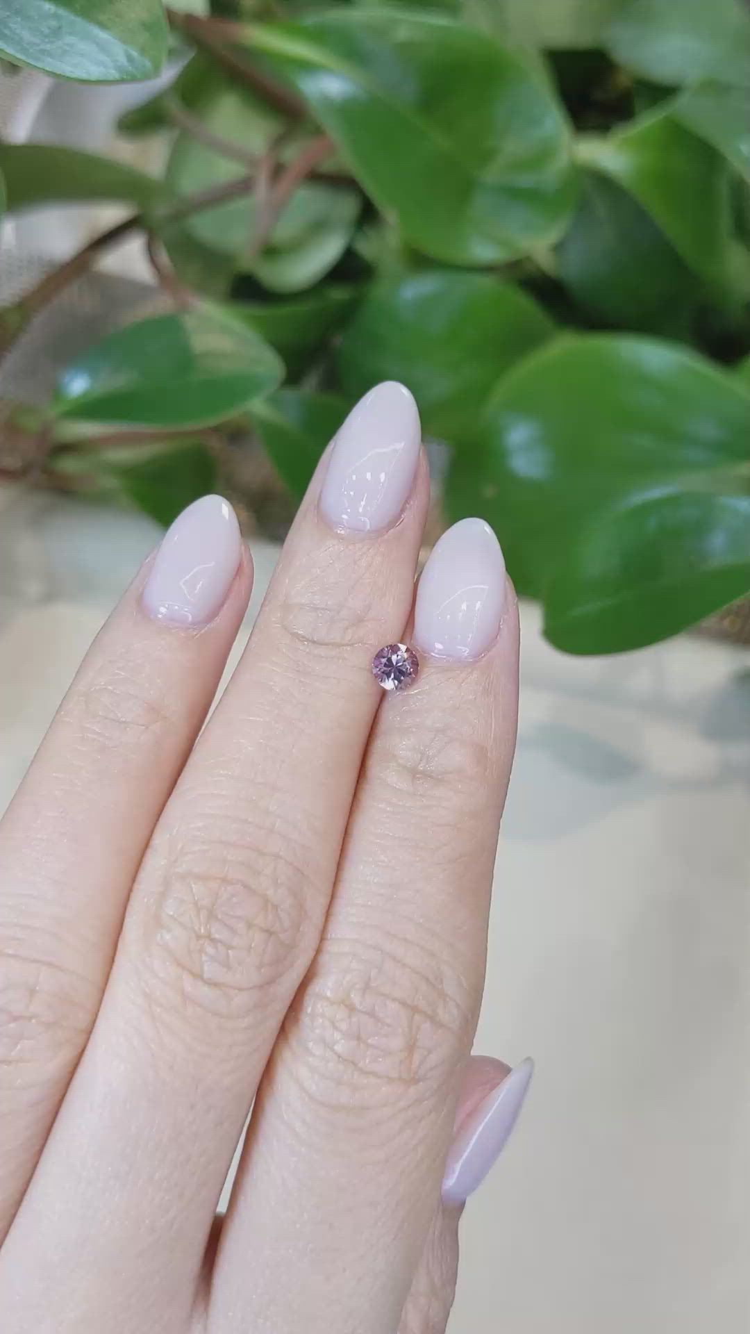 0.49 Ct. Purplish Pink Sapphire from Montana Size Video