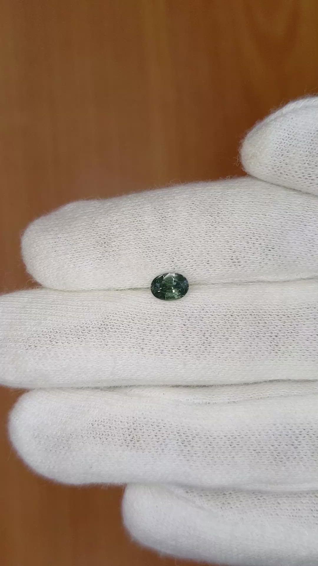 0.64 Ct. Bluish Green Sapphire from Ceylon (Sri Lanka) Size Video