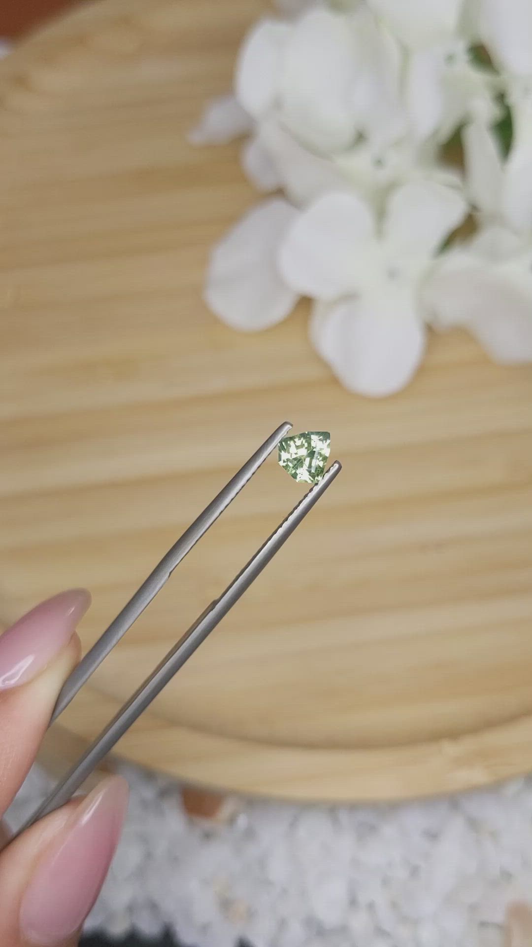 0.68 Ct. Yellowish Green Sapphire from Madagascar Size Video