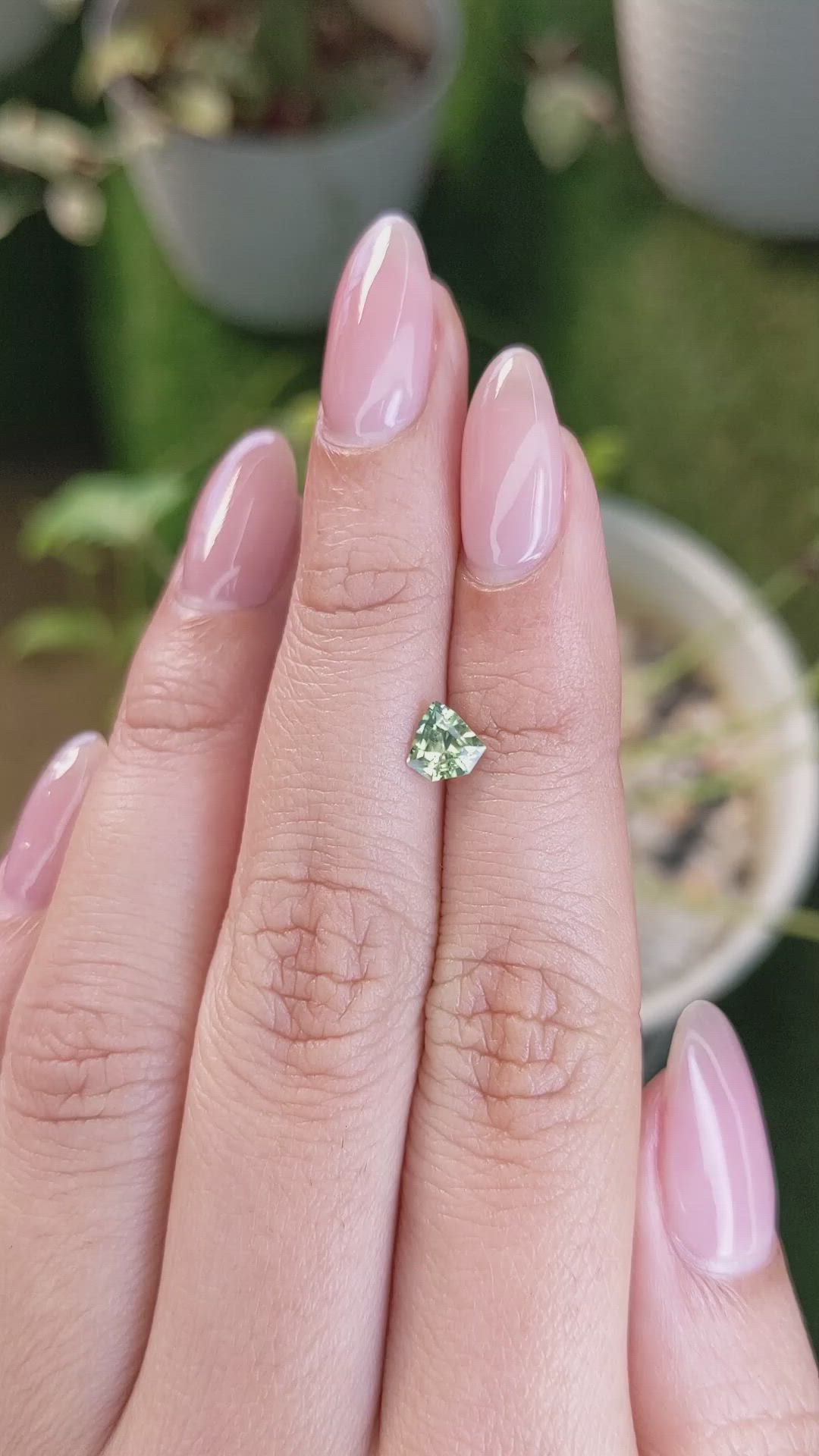 0.68 Ct. Yellowish Green Sapphire from Madagascar Size Video