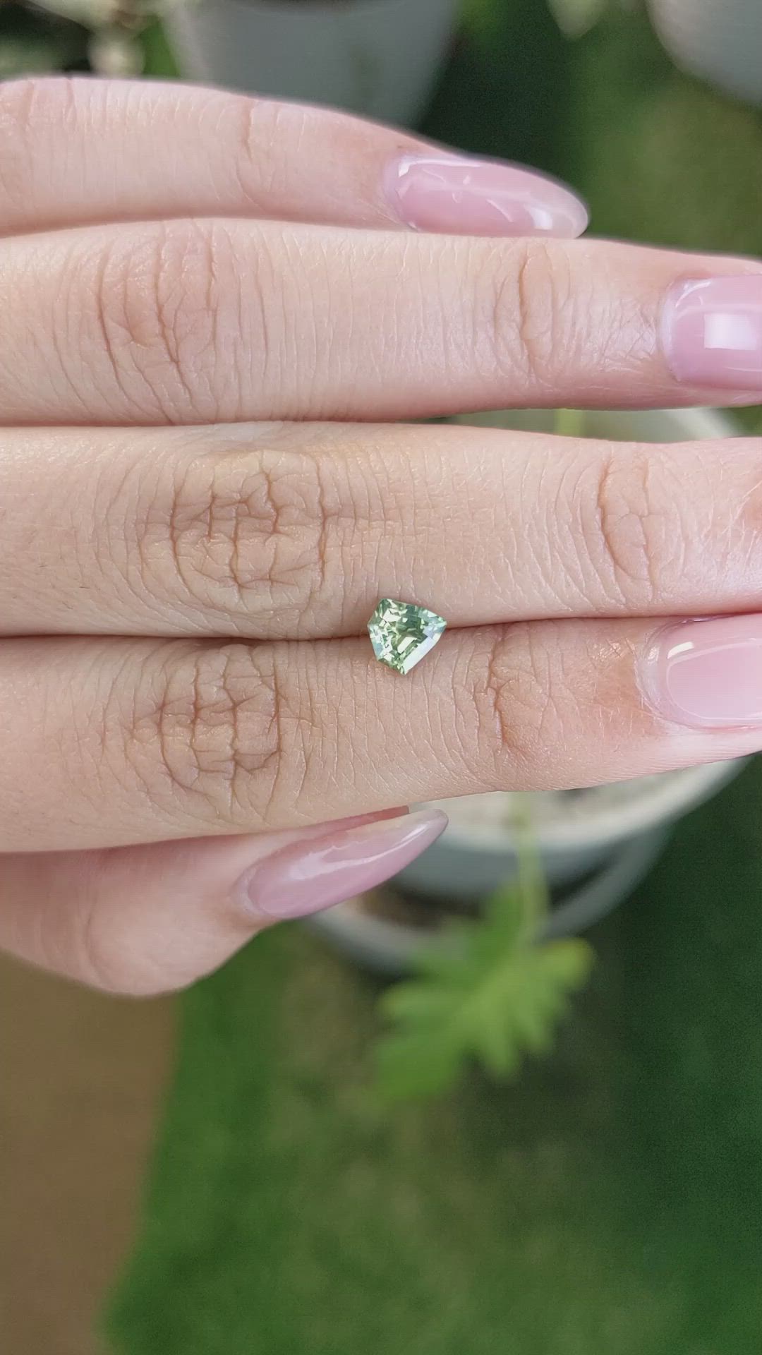 0.68 Ct. Yellowish Green Sapphire from Madagascar Size Video