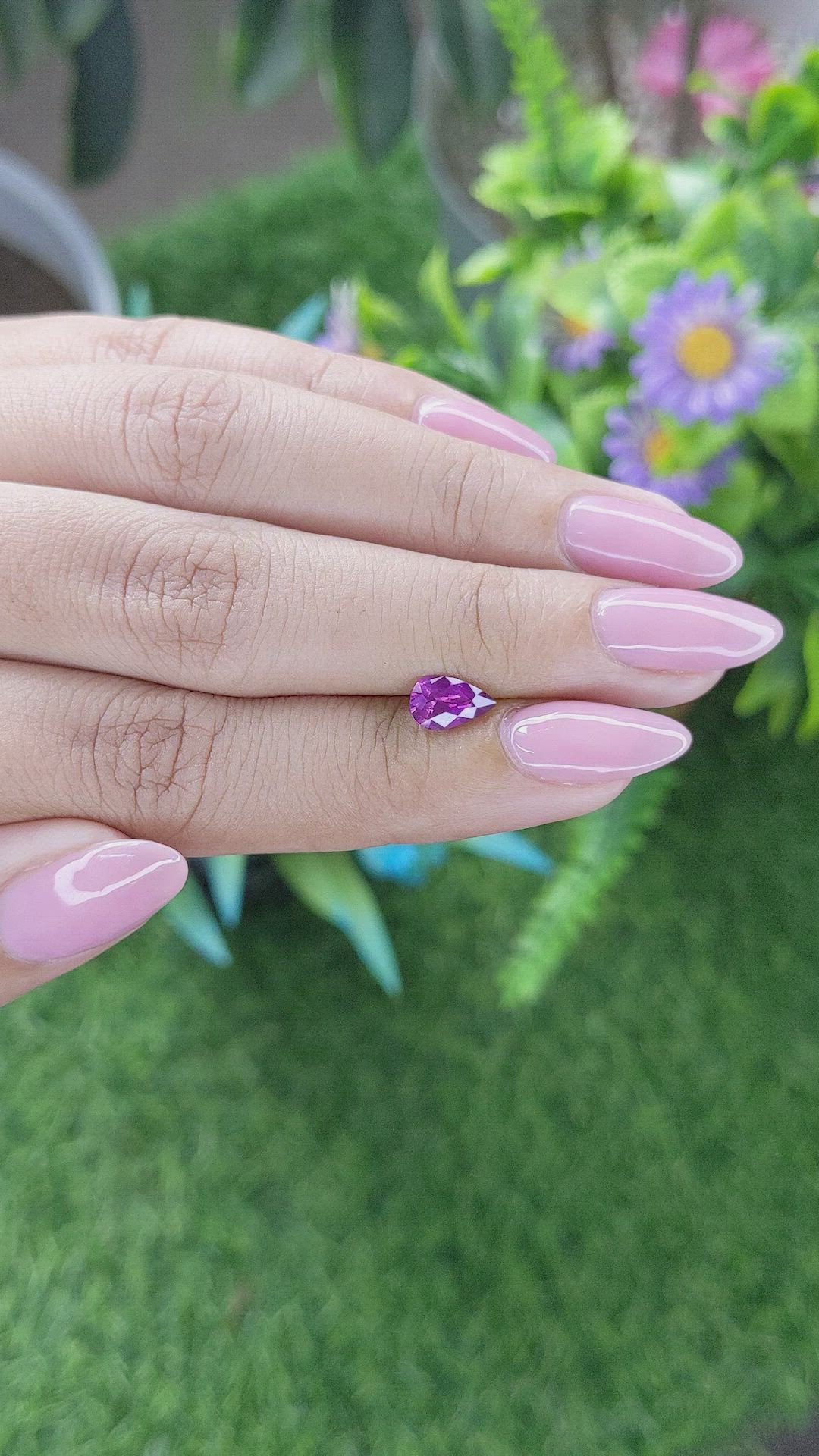 0.86 Ct. Purplish Pink Sapphire from Madagascar Size Video