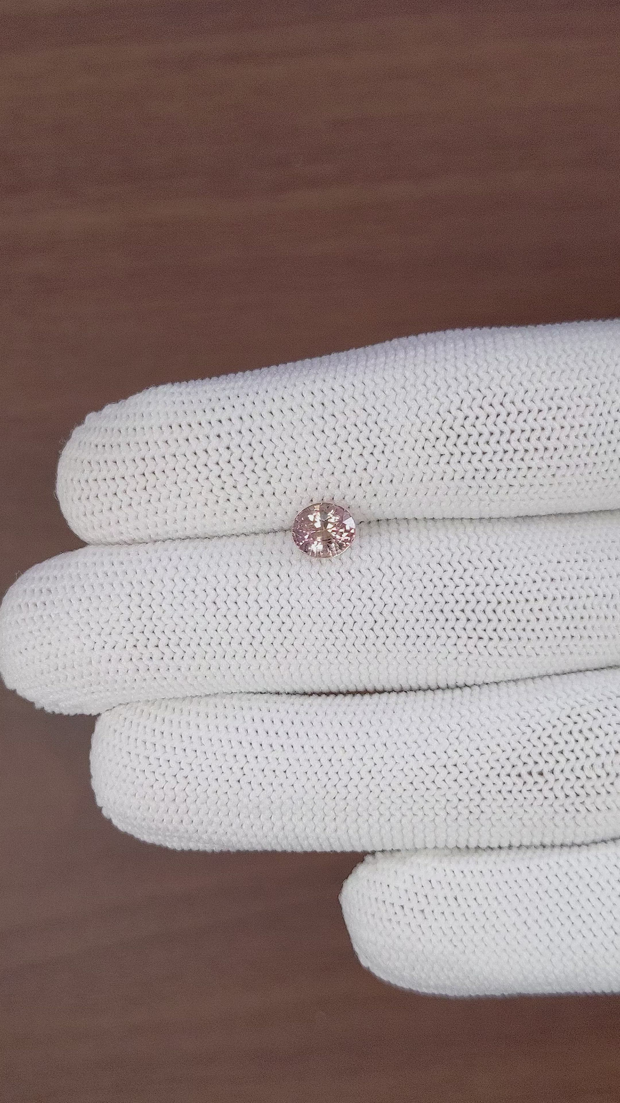 1.25 Ct. Pinkish Brown Sapphire from Madagascar Size Video