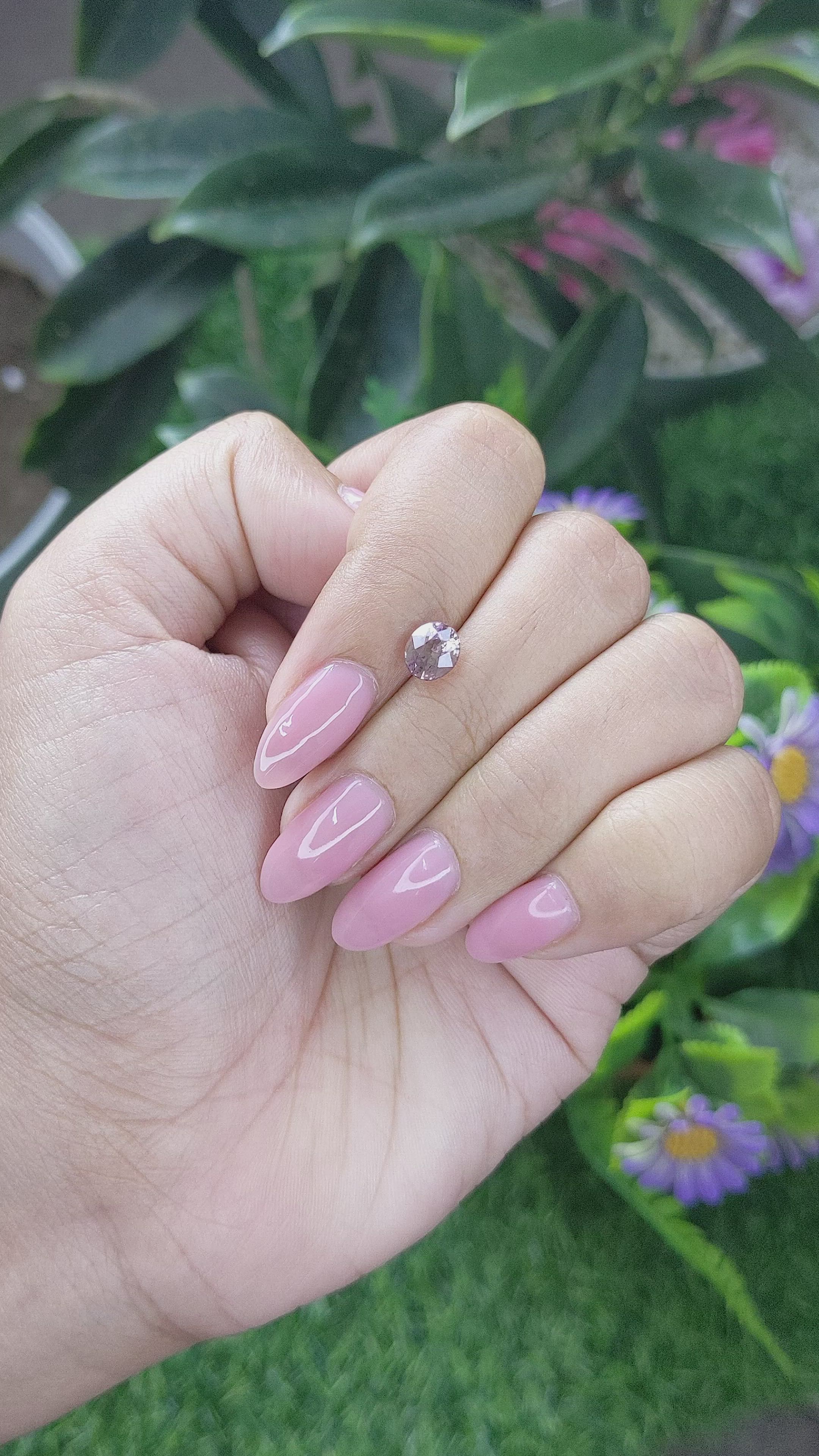 1.25 Ct. Pinkish Brown Sapphire from Madagascar Size Video