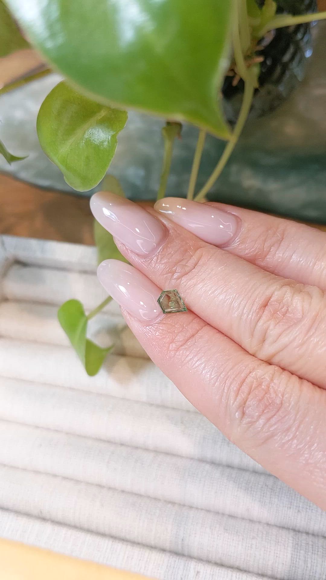 0.79 Ct. Yellowish Green Sapphire from Montana Size Video