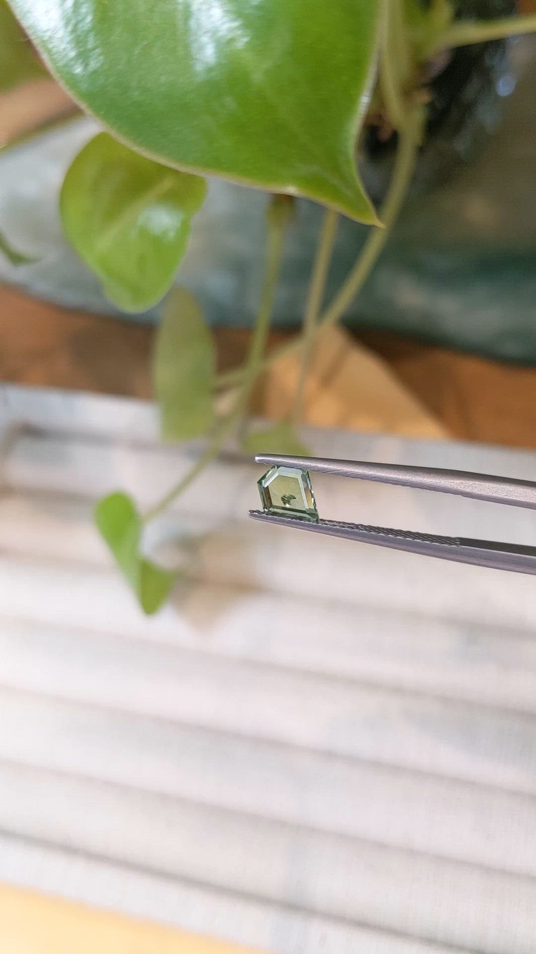0.79 Ct. Yellowish Green Sapphire from Montana Size Video