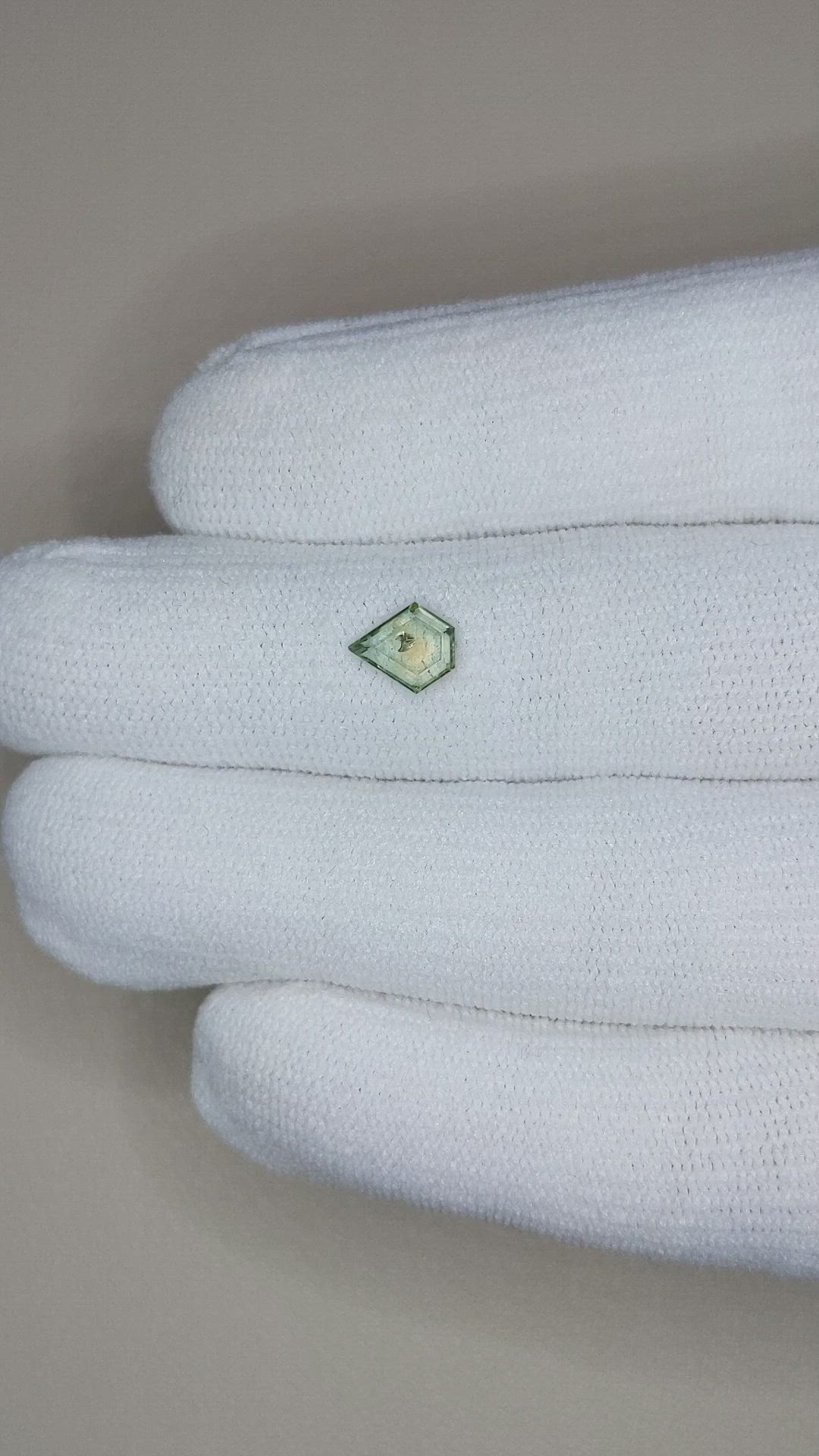 0.79 Ct. Yellowish Green Sapphire from Montana Size Video