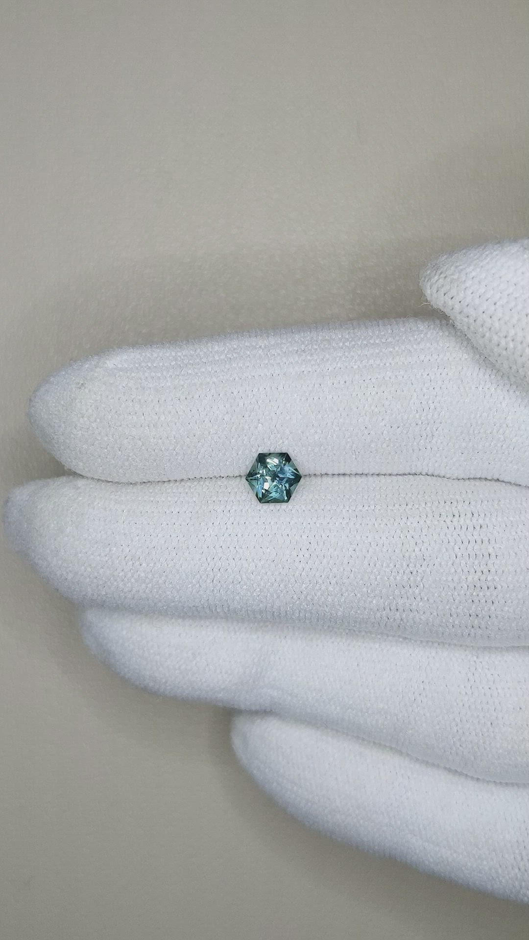 0.56 Ct. Bluish Green Sapphire from Montana Size Video