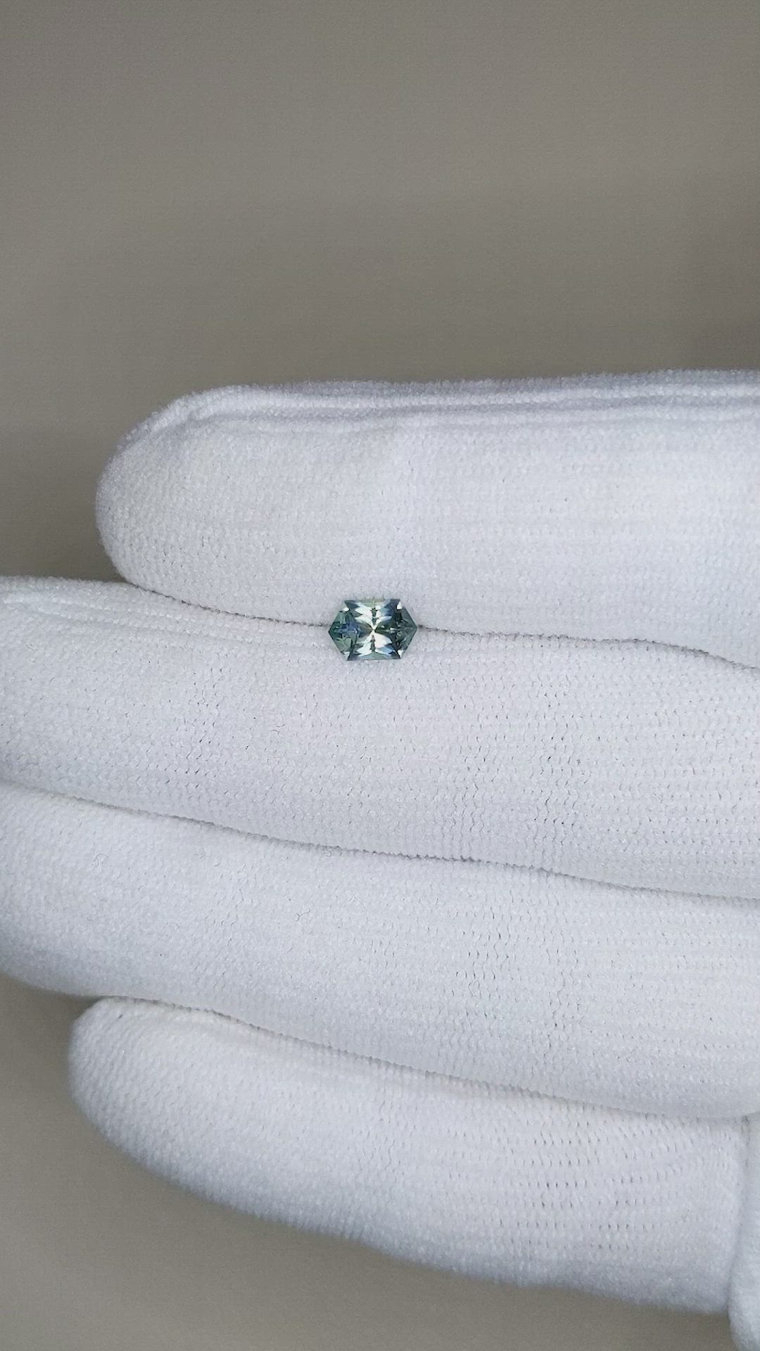 0.63 Ct. Bluish Green Sapphire from Montana Size Video
