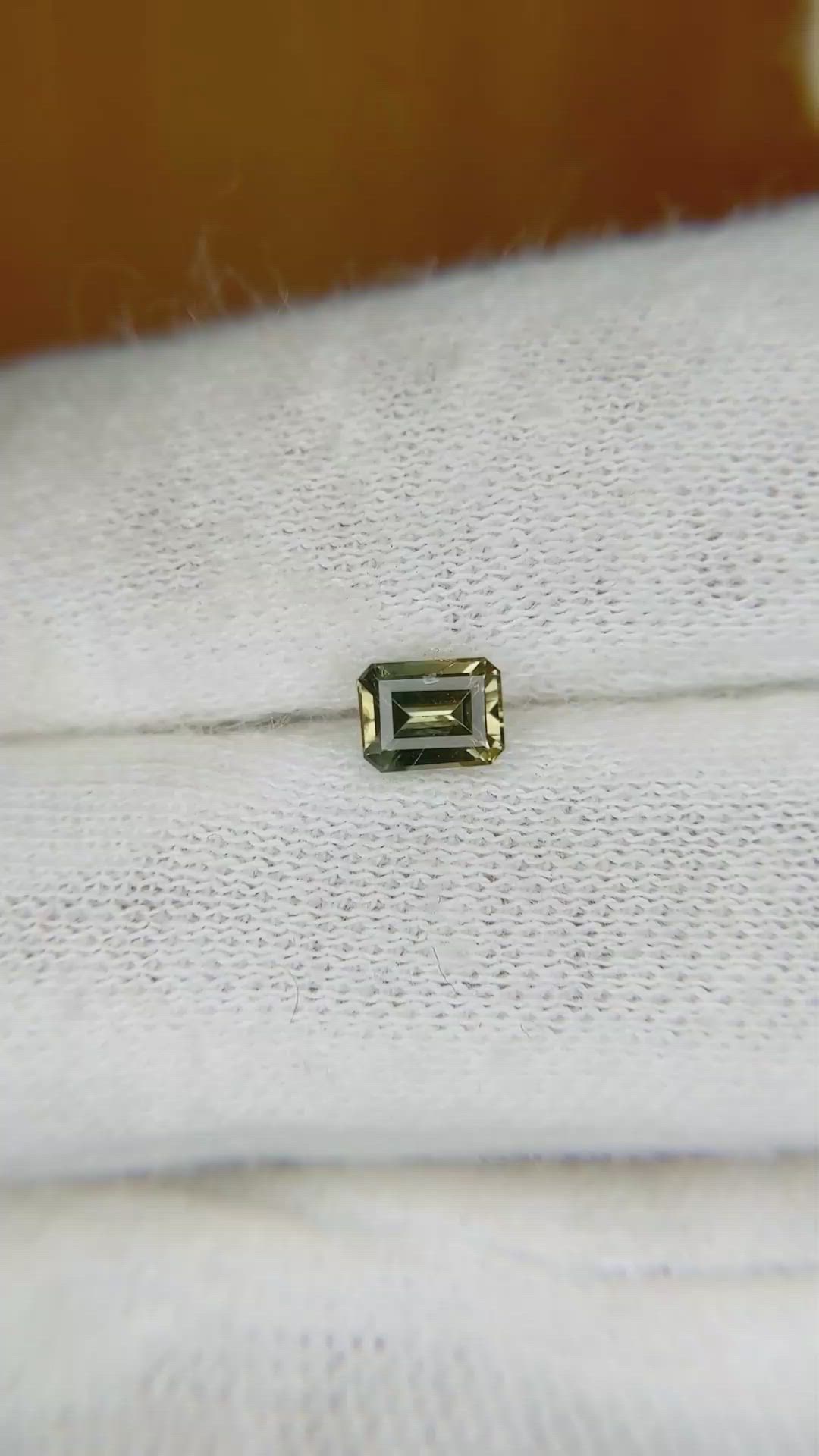 0.60 Ct. Greenish Yellow Sapphire from Ceylon (Sri Lanka) Size Video