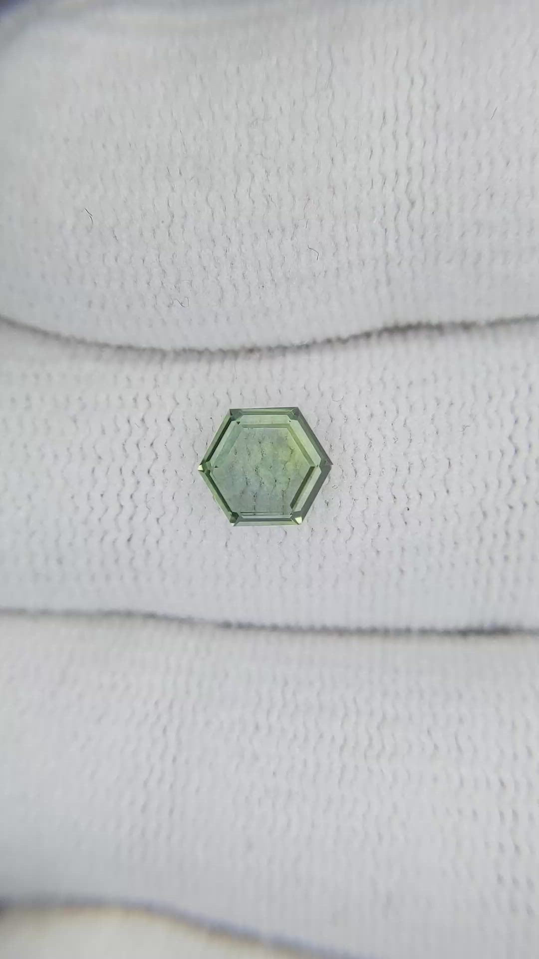 0.92 Ct. Yellowish Green Sapphire from Montana Size Video