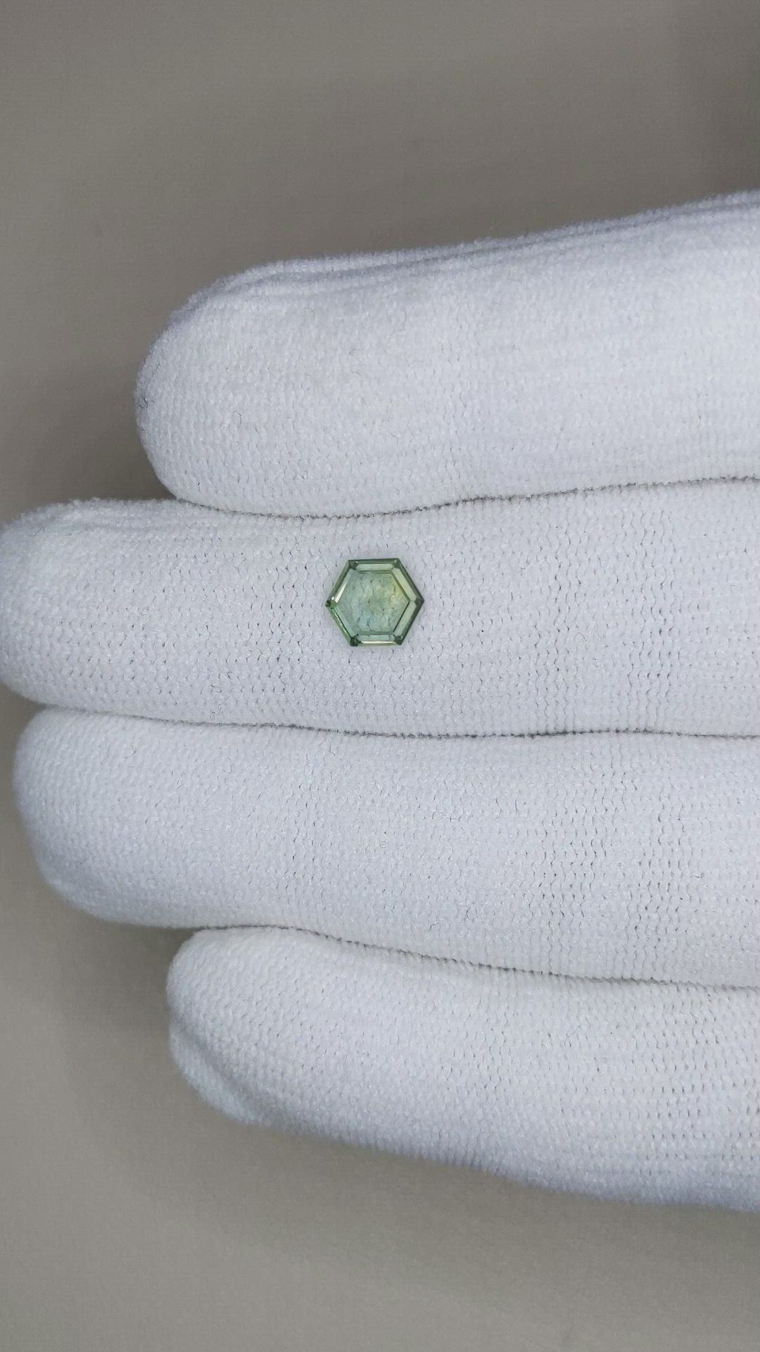 0.92 Ct. Yellowish Green Sapphire from Montana Size Video