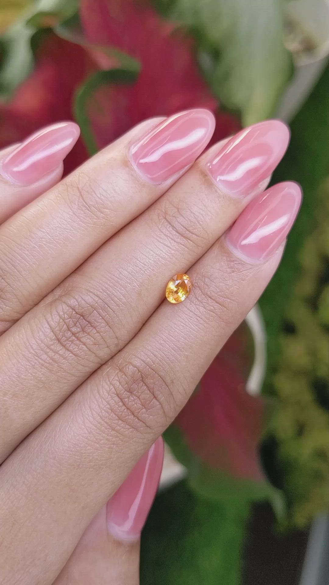 0.51 Ct. Orange Sapphire from Ceylon (Sri Lanka) Size Video