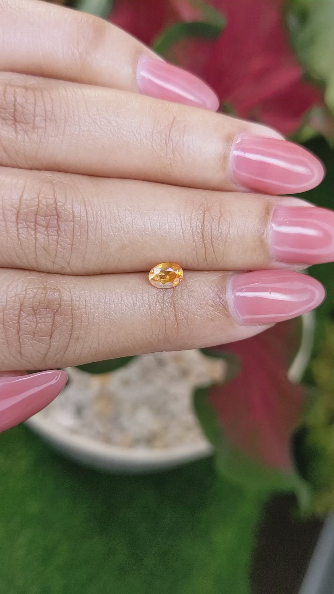 0.51 Ct. Orange Sapphire from Ceylon (Sri Lanka) Size Video