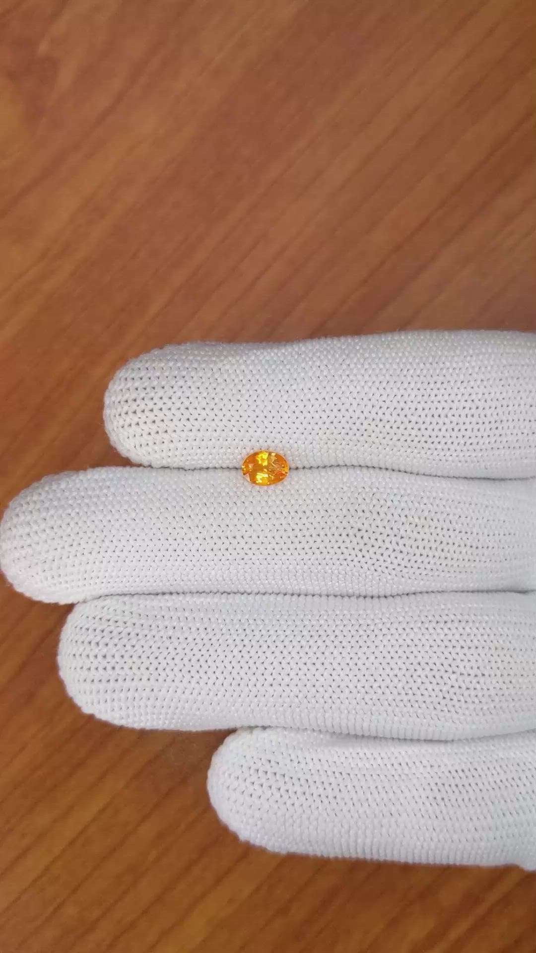 0.51 Ct. Orange Sapphire from Ceylon (Sri Lanka) Size Video