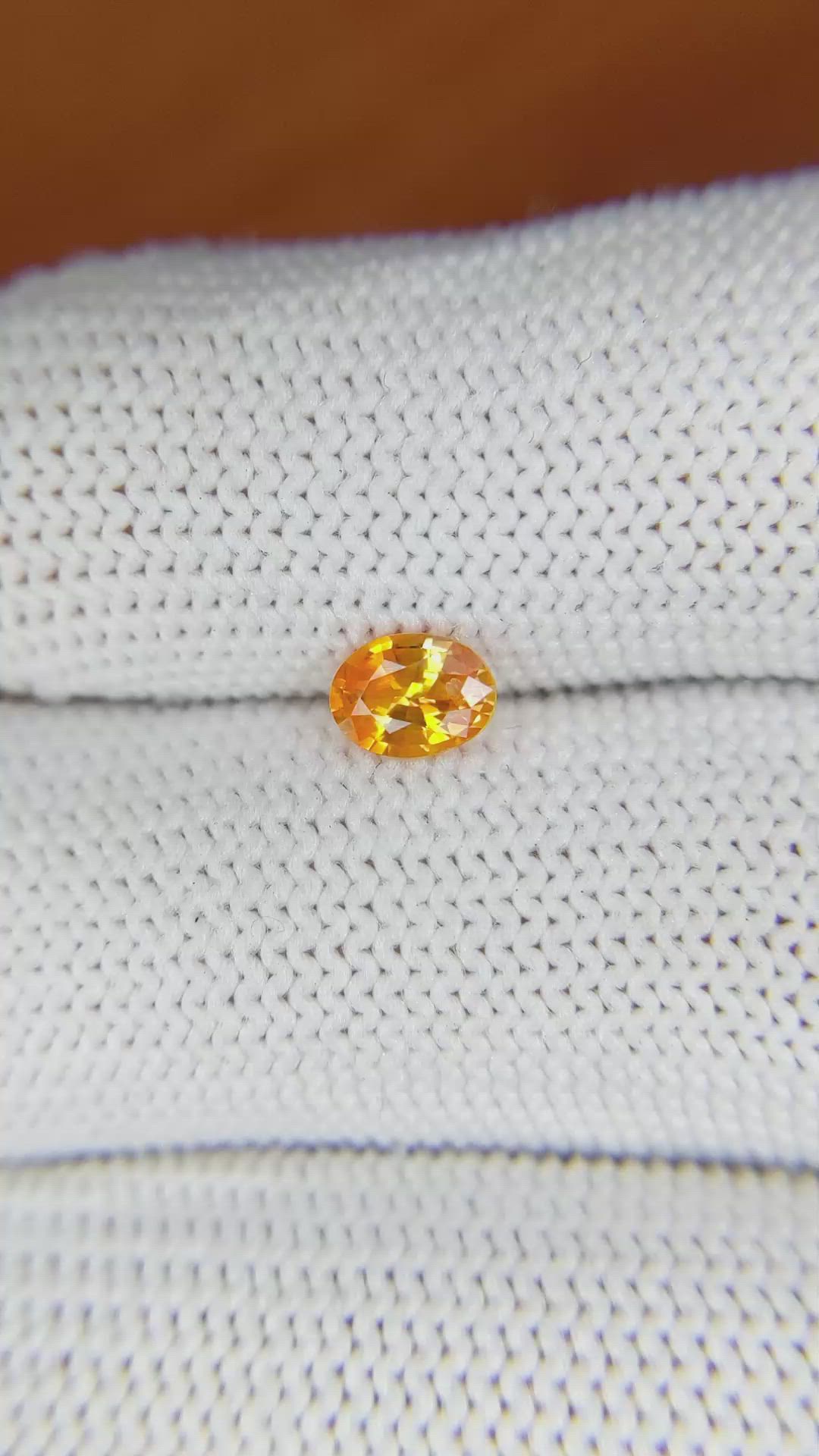 0.51 Ct. Orange Sapphire from Ceylon (Sri Lanka) Size Video