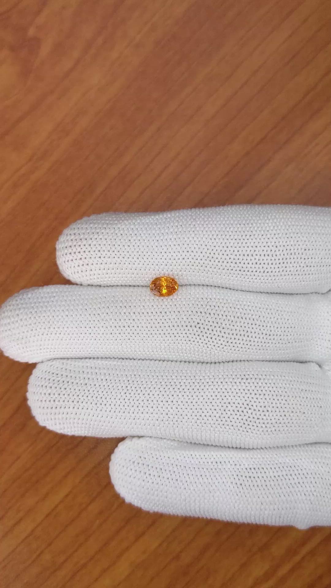 0.75 Ct. Orange Sapphire from Ceylon (Sri Lanka) Size Video