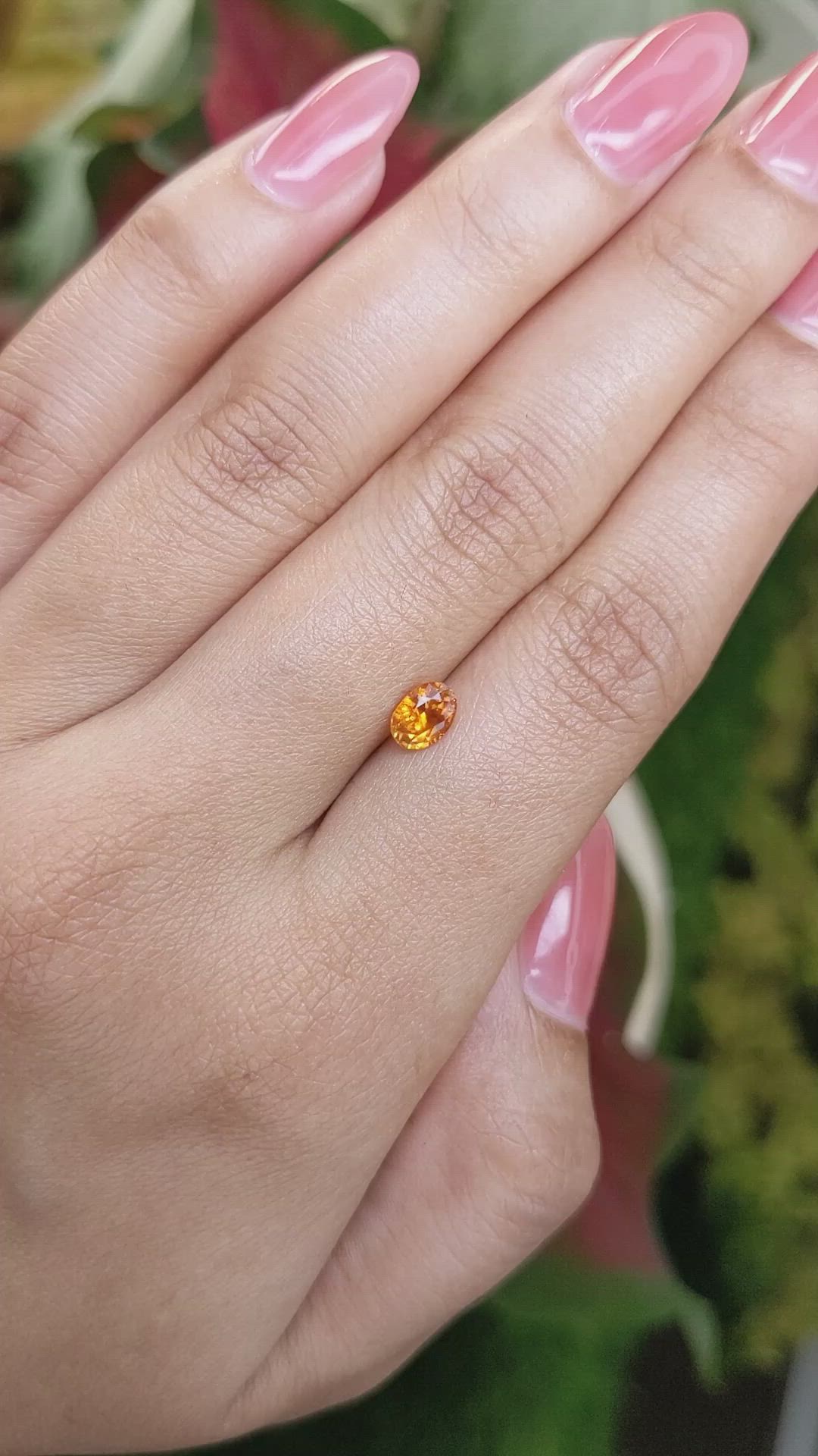 0.75 Ct. Orange Sapphire from Ceylon (Sri Lanka) Size Video