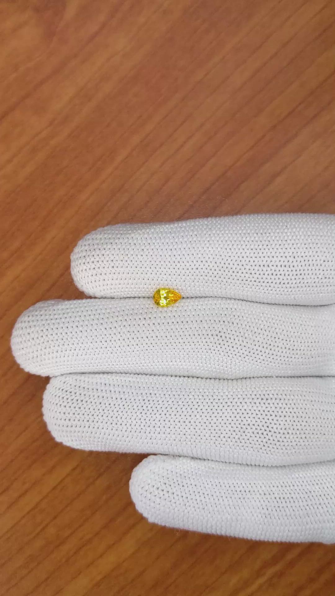 0.46 Ct. Orangish Yellow Sapphire from Ceylon (Sri Lanka) Size Video