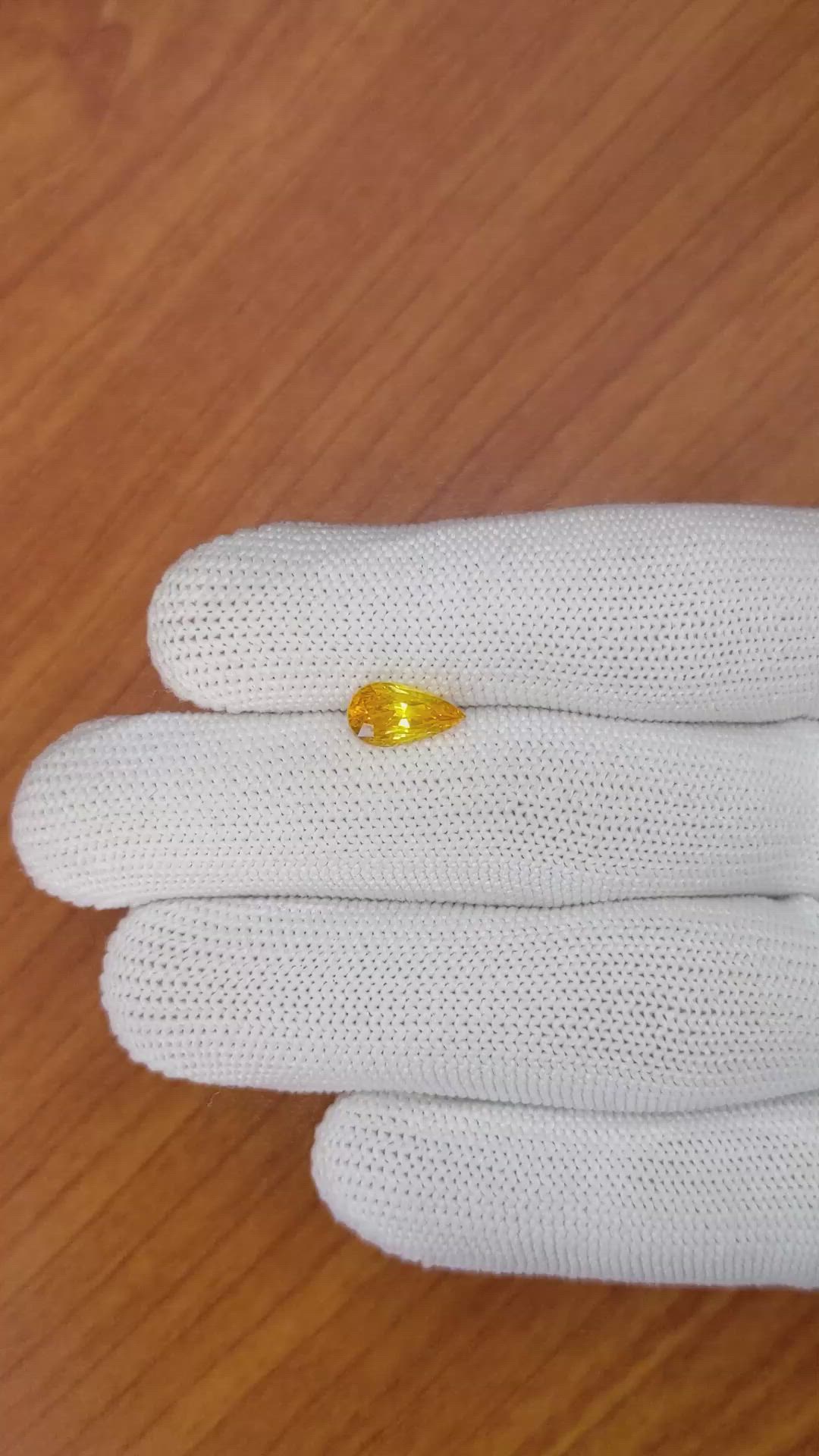 2.00 Ct. Yellowish Orange Sapphire from Ceylon (Sri Lanka) Size Video