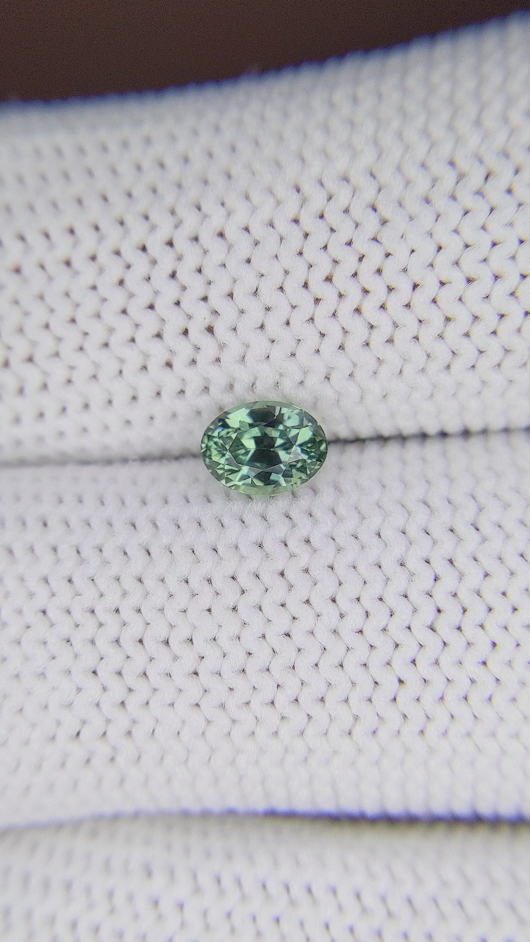 0.78 Ct. Bluish Green Sapphire from Tanzania Size Video