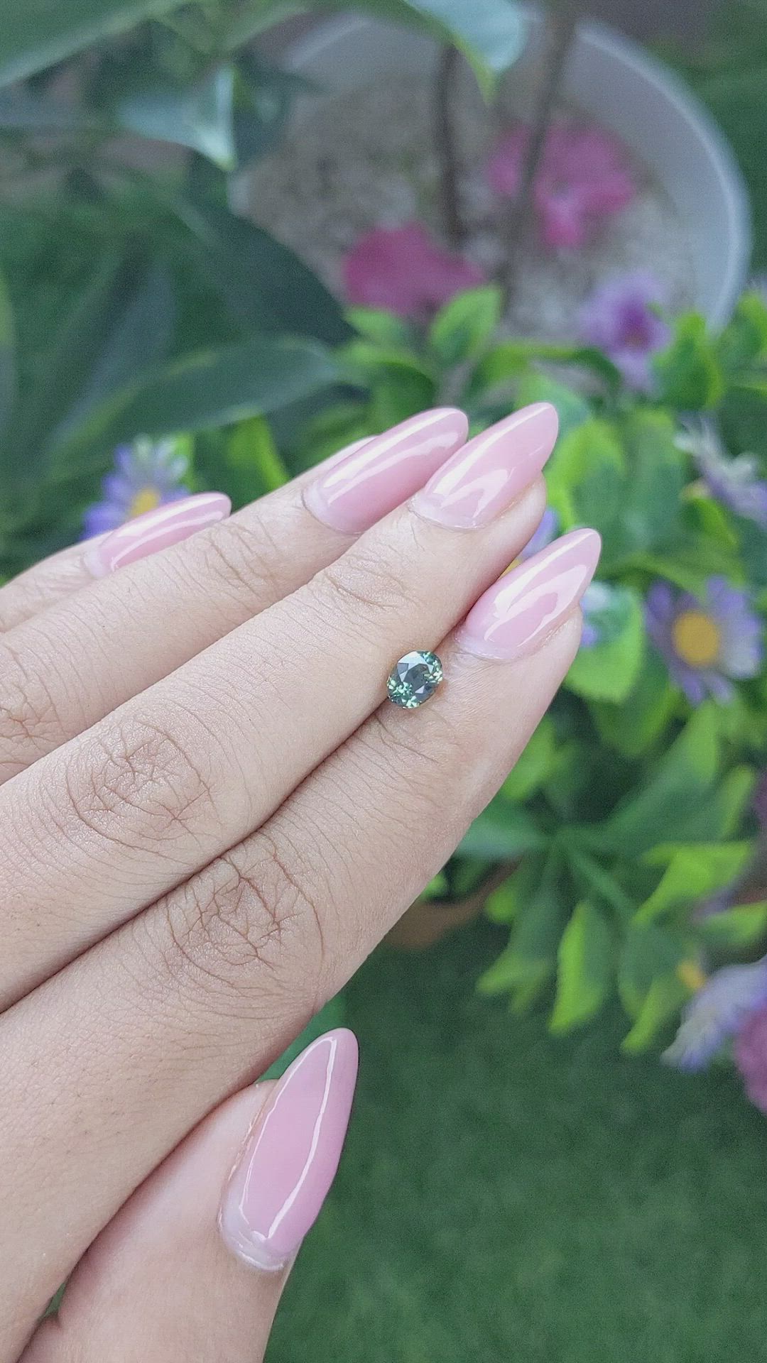 0.78 Ct. Bluish Green Sapphire from Tanzania Size Video