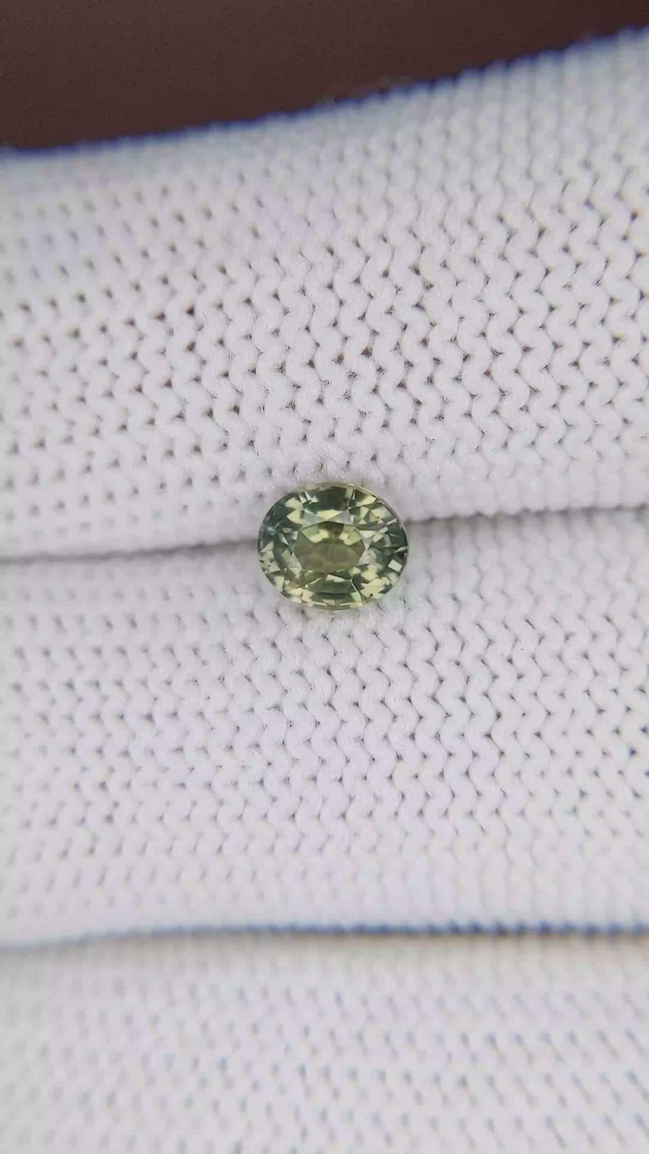 0.96 Ct. Yellowish Green Sapphire from Tanzania Size Video