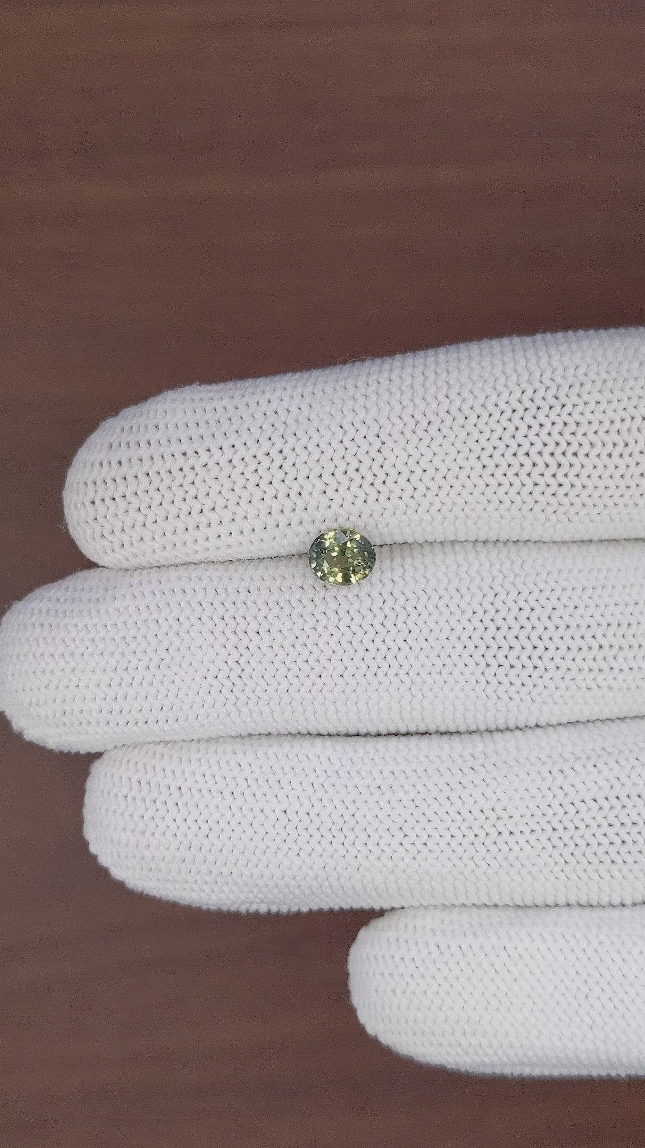 0.96 Ct. Yellowish Green Sapphire from Tanzania Size Video