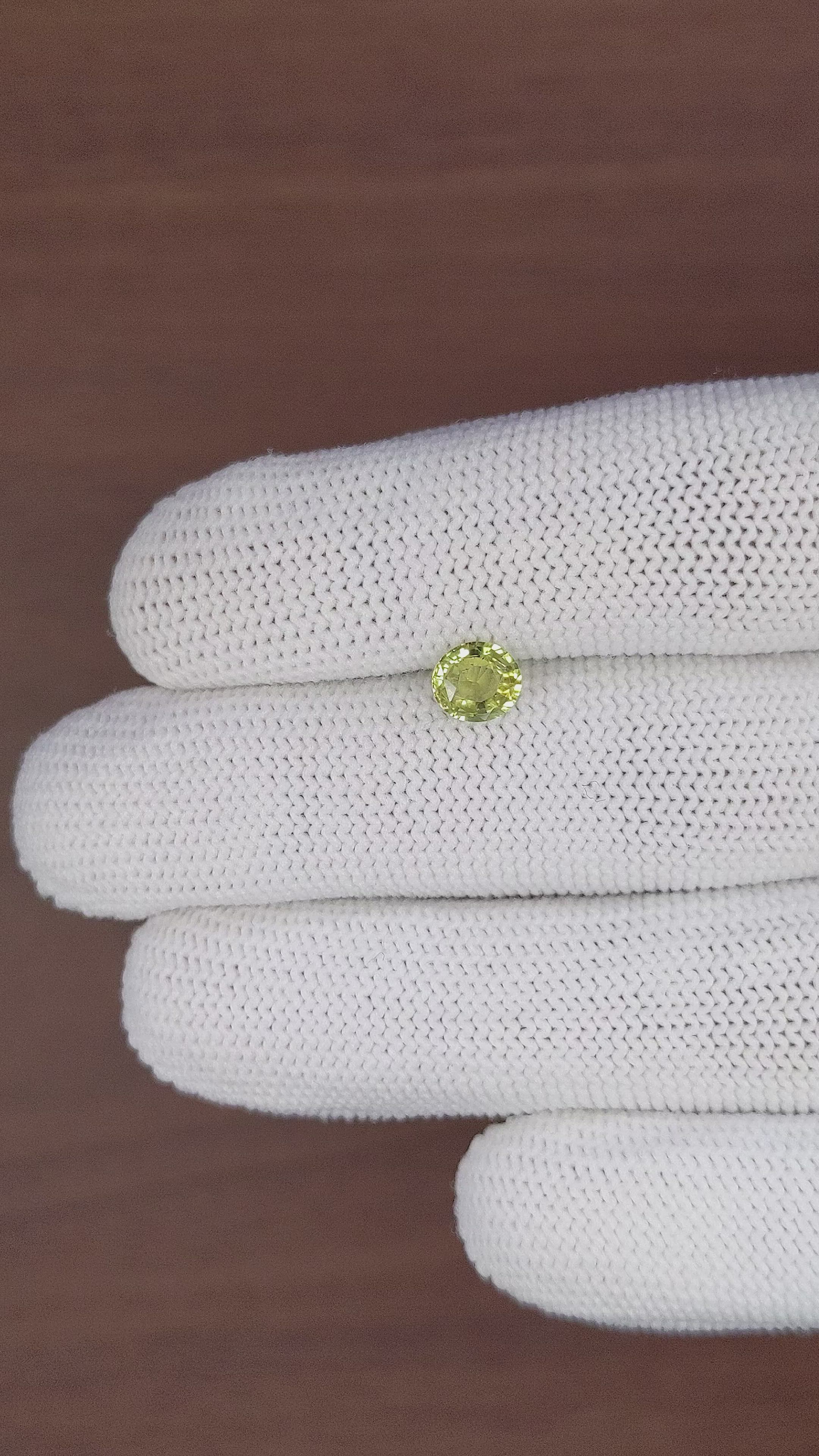 0.96 Ct. Greenish Yellow Sapphire from Tanzania Size Video