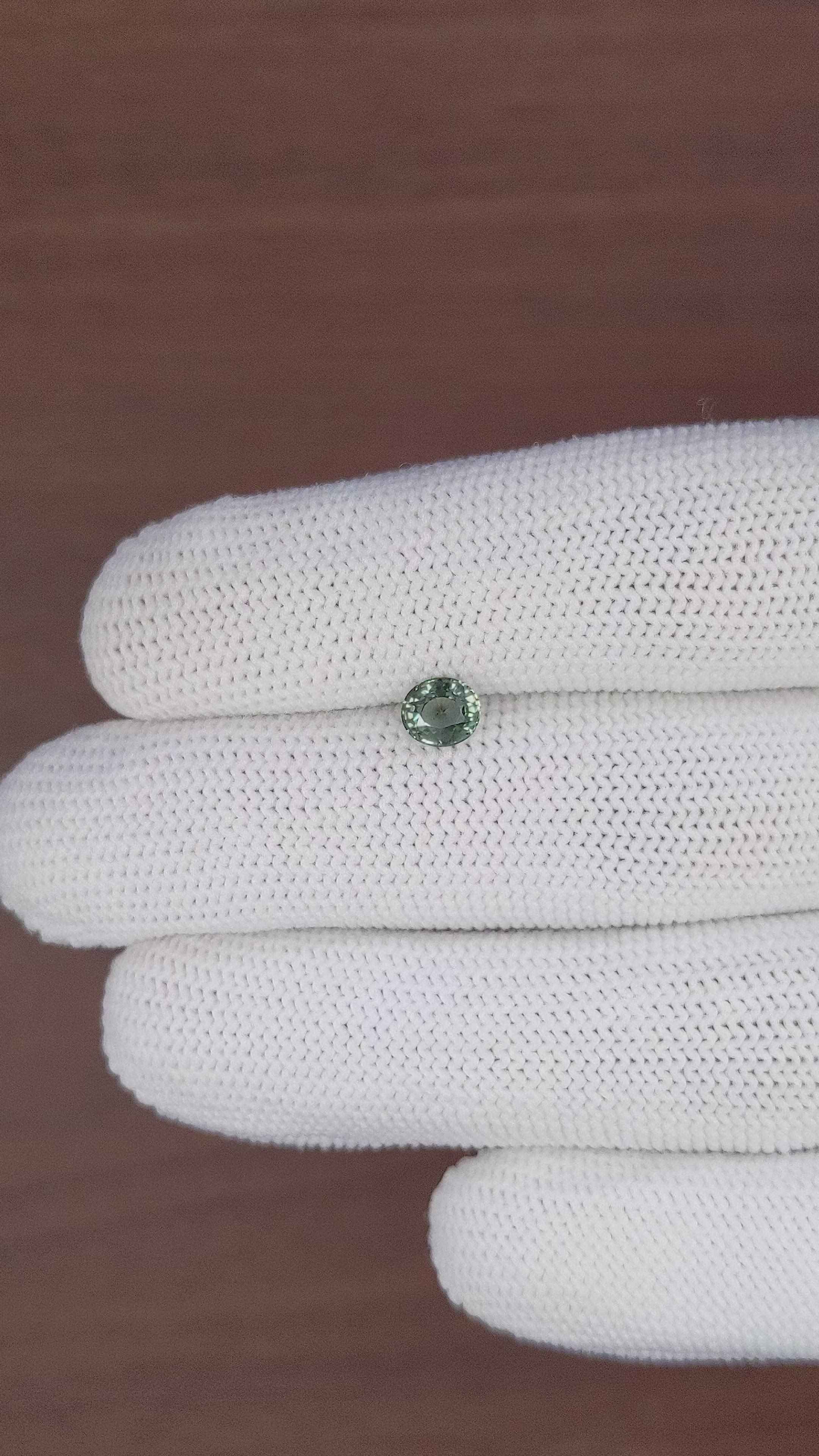 0.83 Ct. Bluish Green Sapphire from Tanzania Size Video